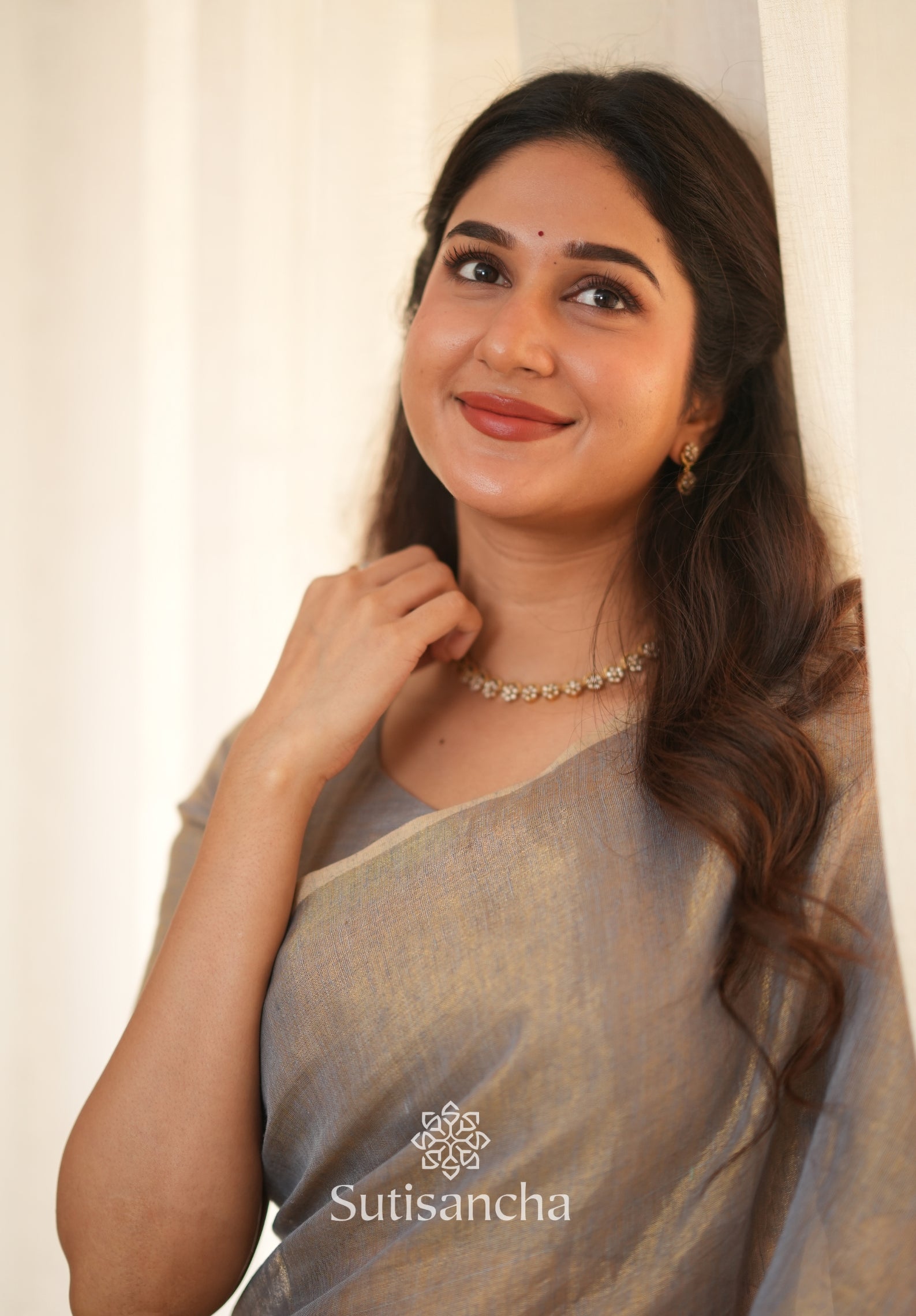 Tissue Charm Light and Lustrous Linen Saree