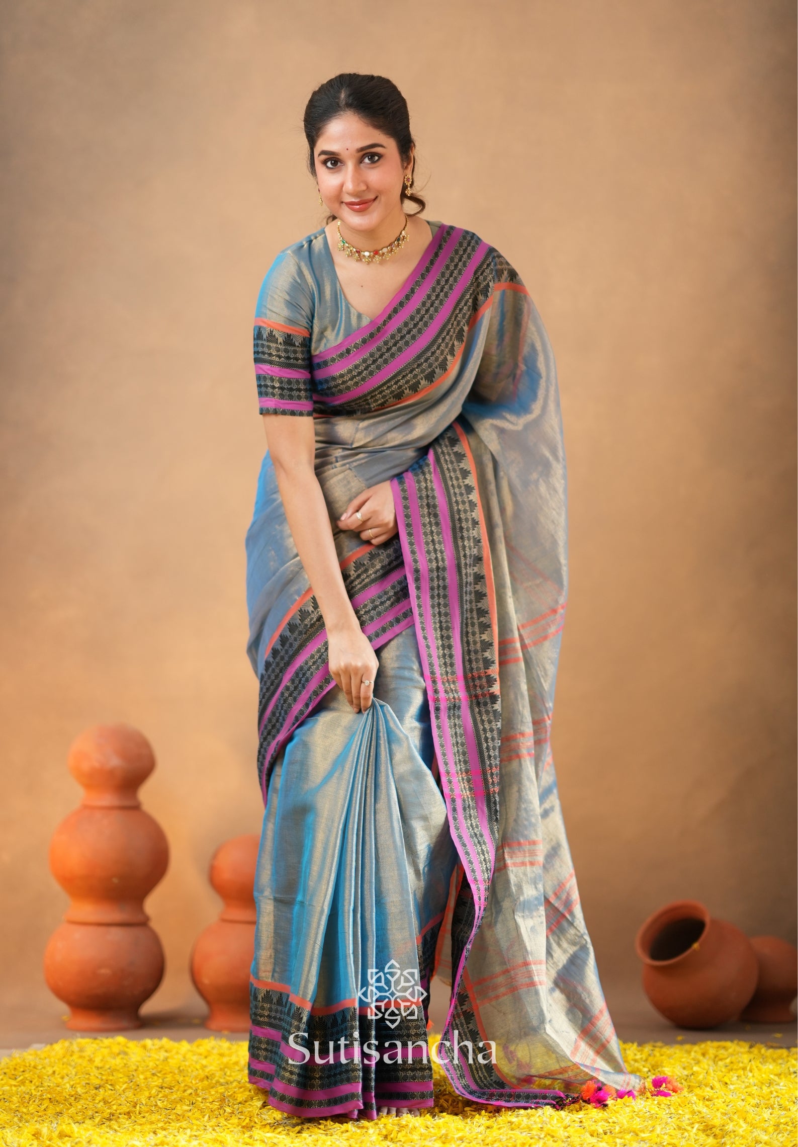 South Charm Tissue Cotton Saree with Traditional Border