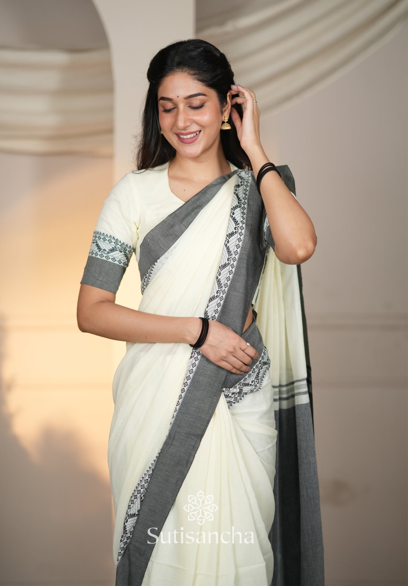 The Weaver's Touch: Pure Bengal Cotton Saree with Timeless Appeal