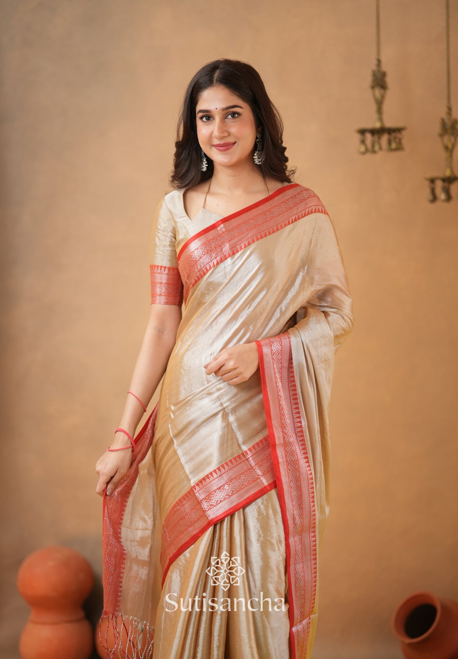 Traditional Tissue Saree with Rich Red Border