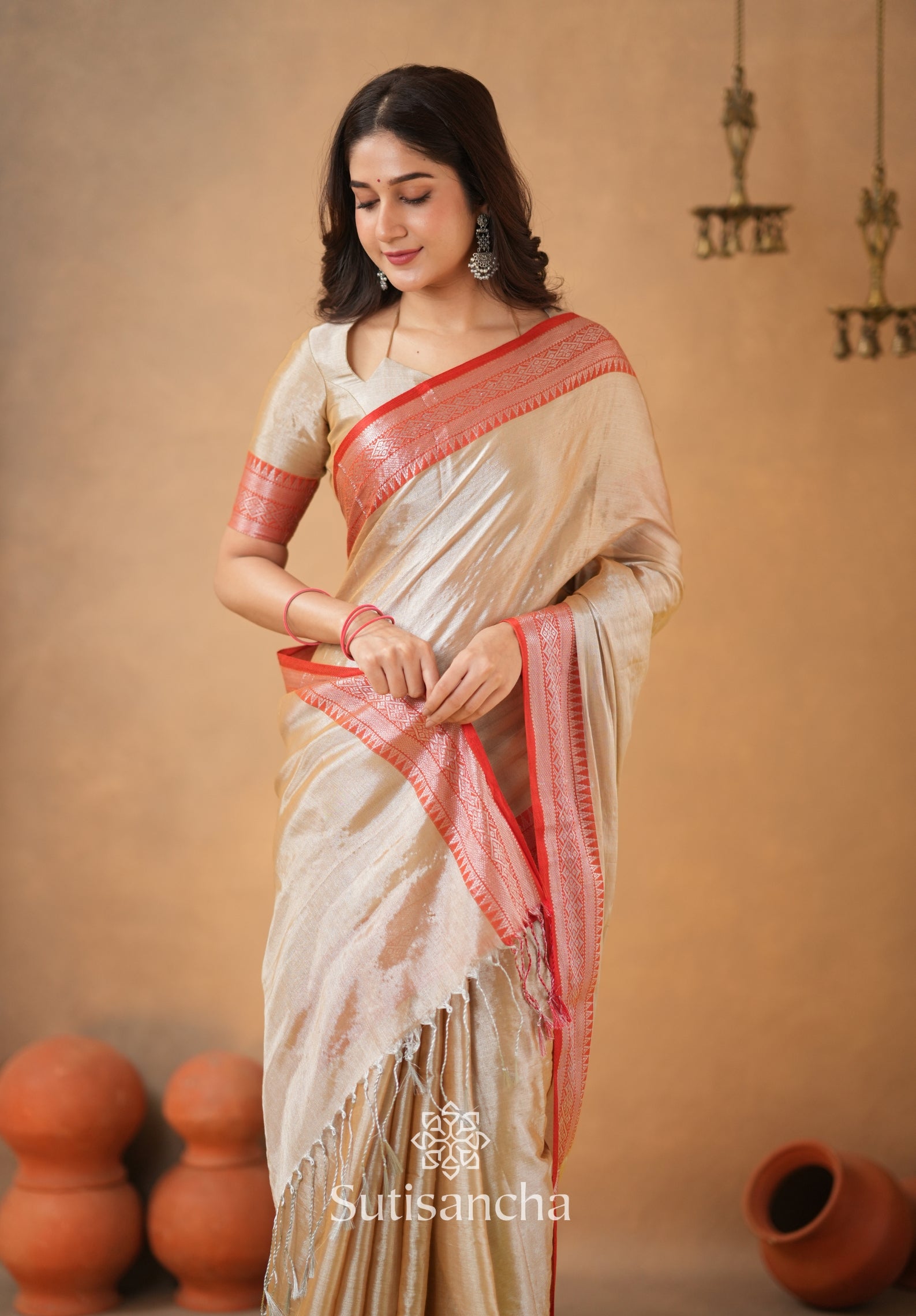 Traditional Tissue Saree with Rich Red Border
