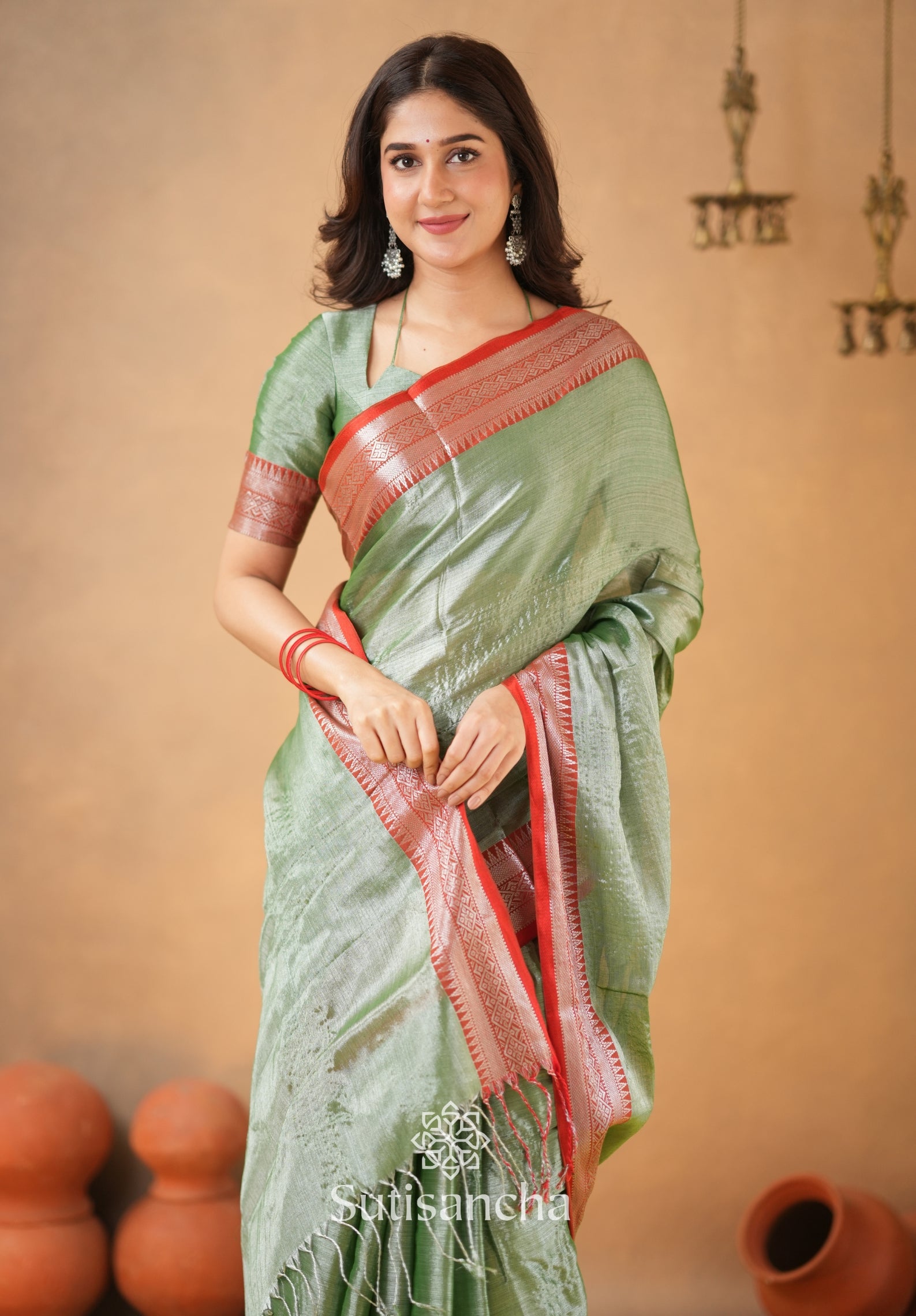 Traditional Tissue Saree with Rich Red Border
