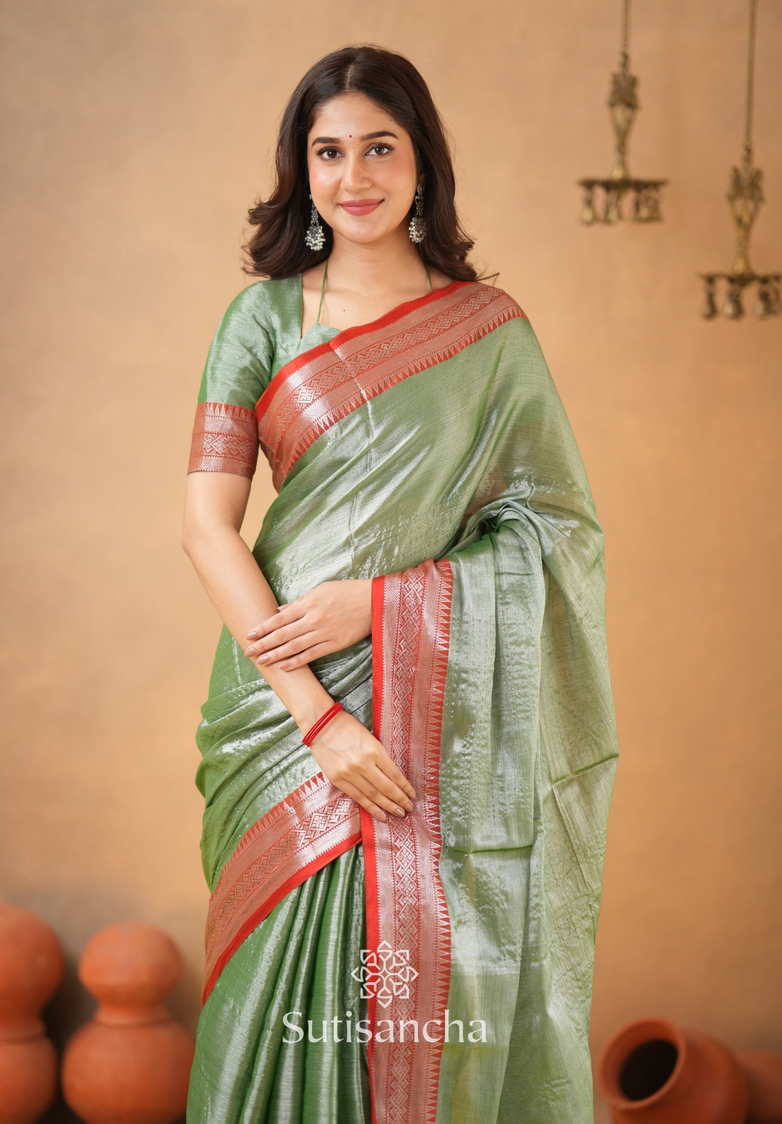 Traditional Tissue Saree with Rich Red Border