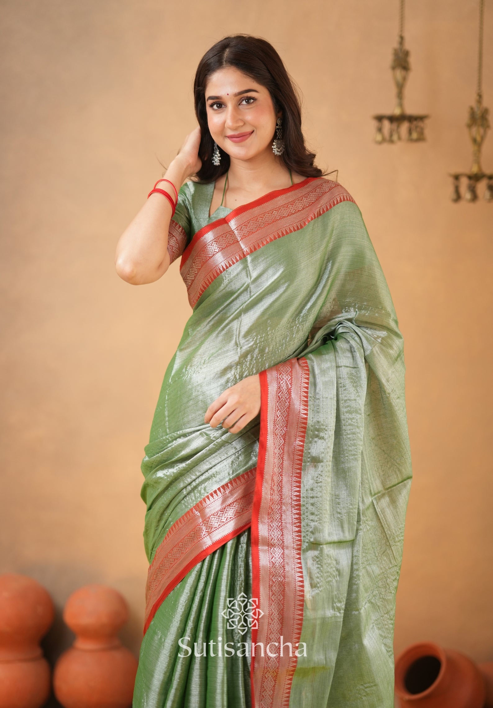 Traditional Tissue Saree with Rich Red Border