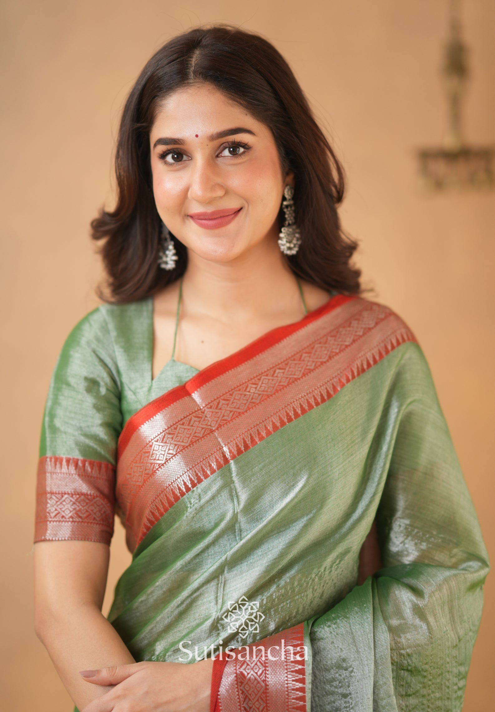 Traditional Tissue Saree with Rich Red Border