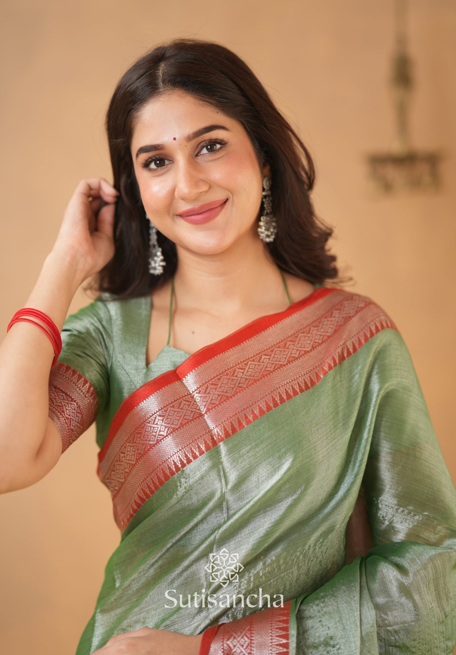 Traditional Tissue Saree with Rich Red Border