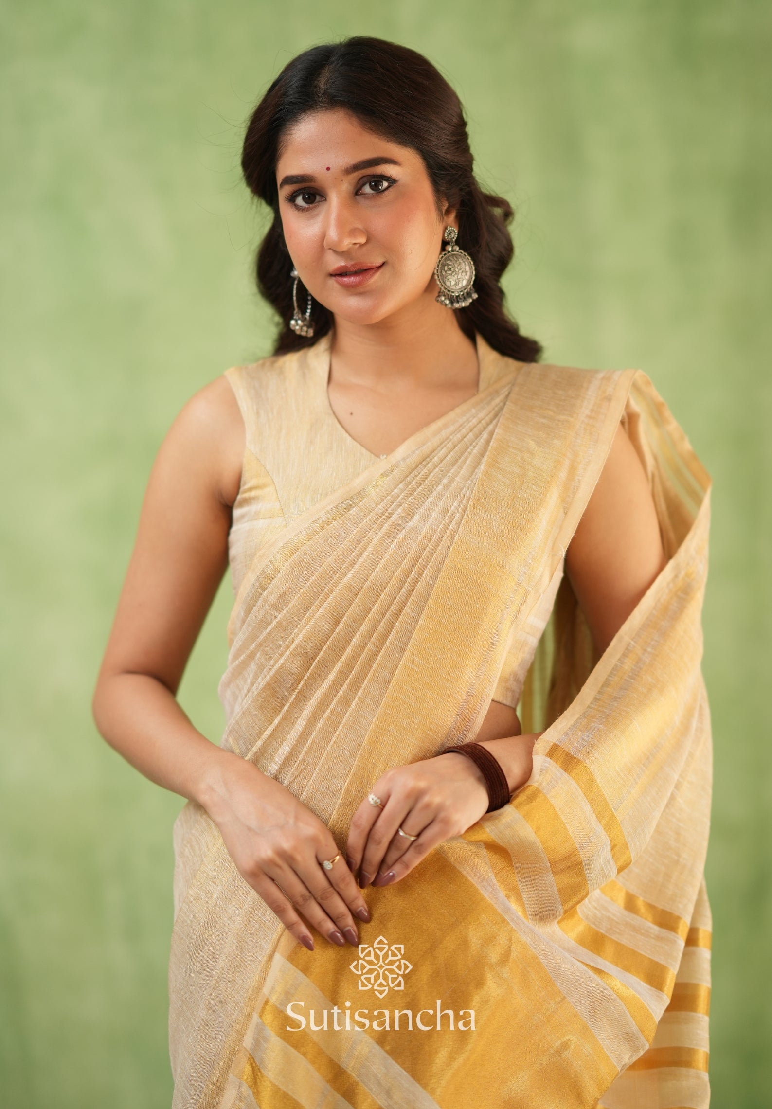 Opulent Golden Border Saree with Tassel Detailing – Cotton Linen Weave