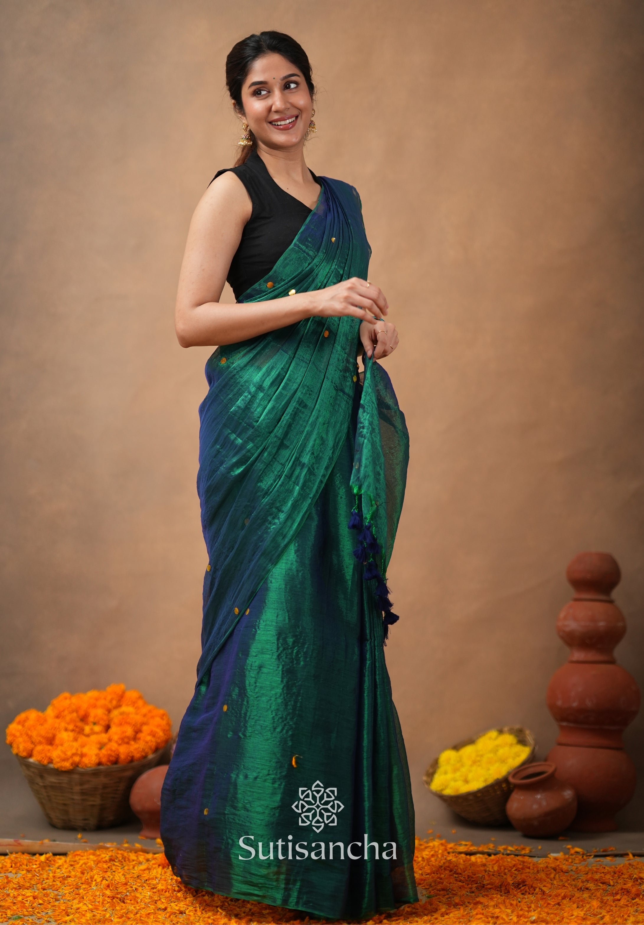 Premium Tissue Saree Accented with Siquin Shine
