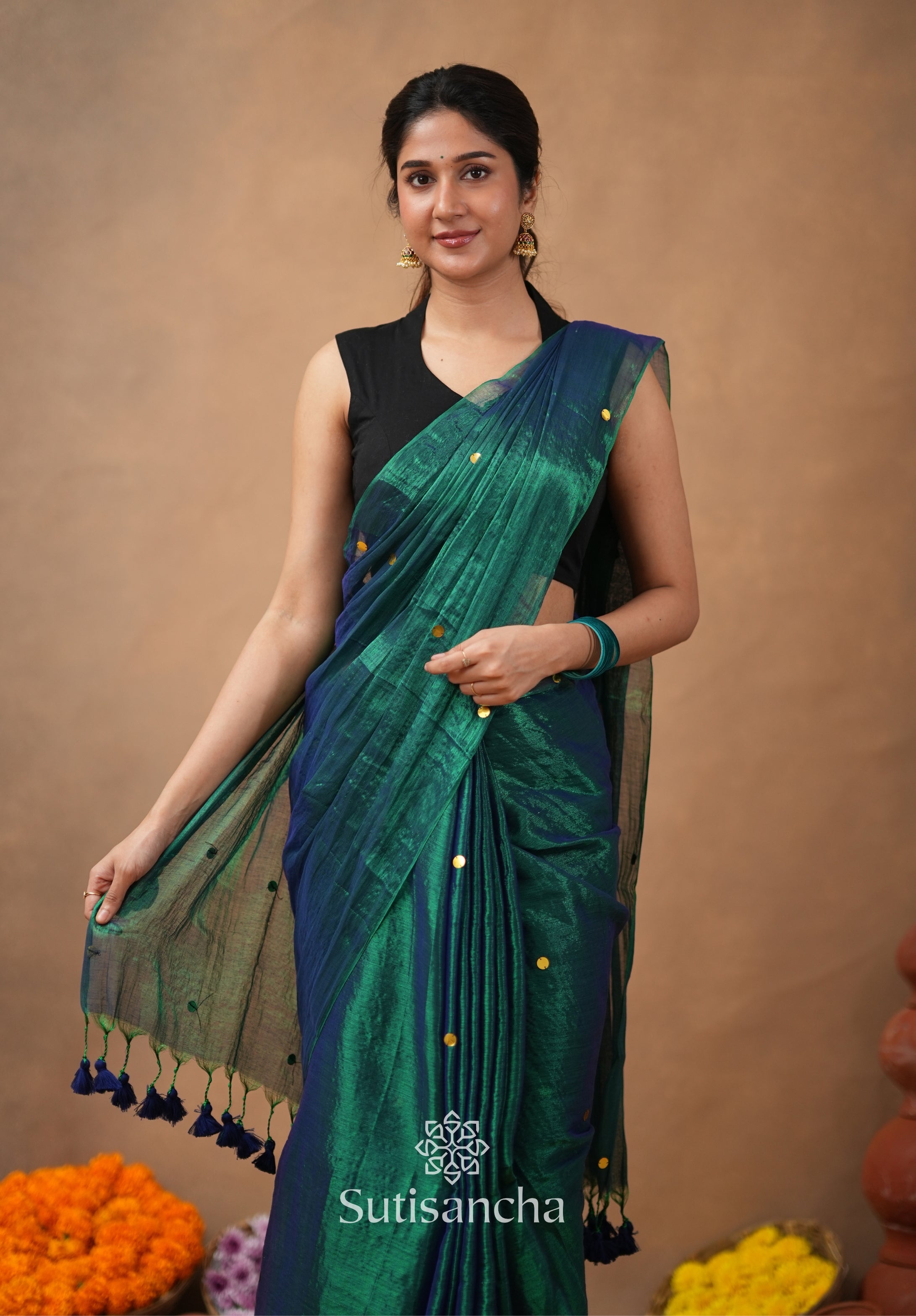 Premium Tissue Saree Accented with Siquin Shine