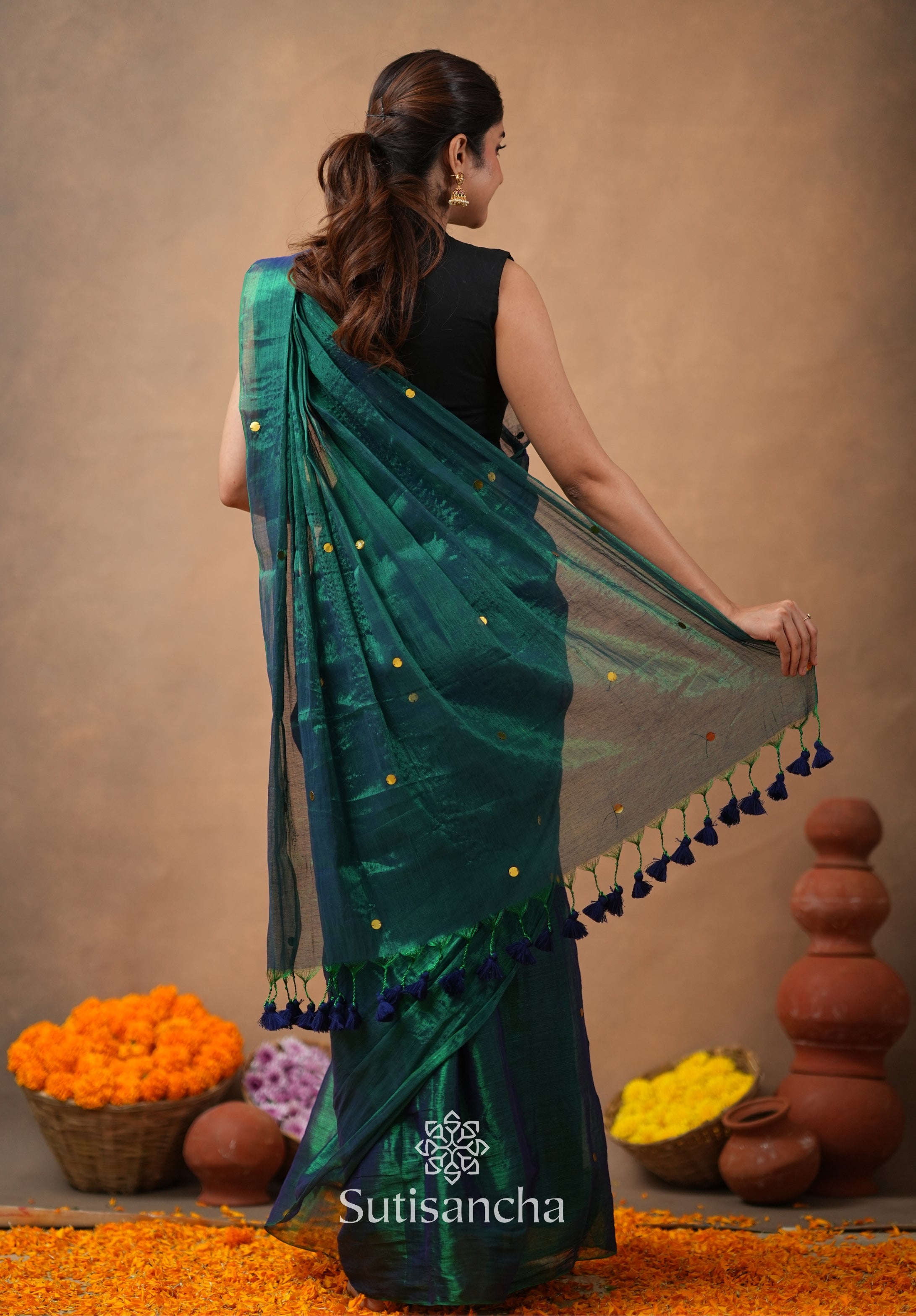 Premium Tissue Saree Accented with Siquin Shine