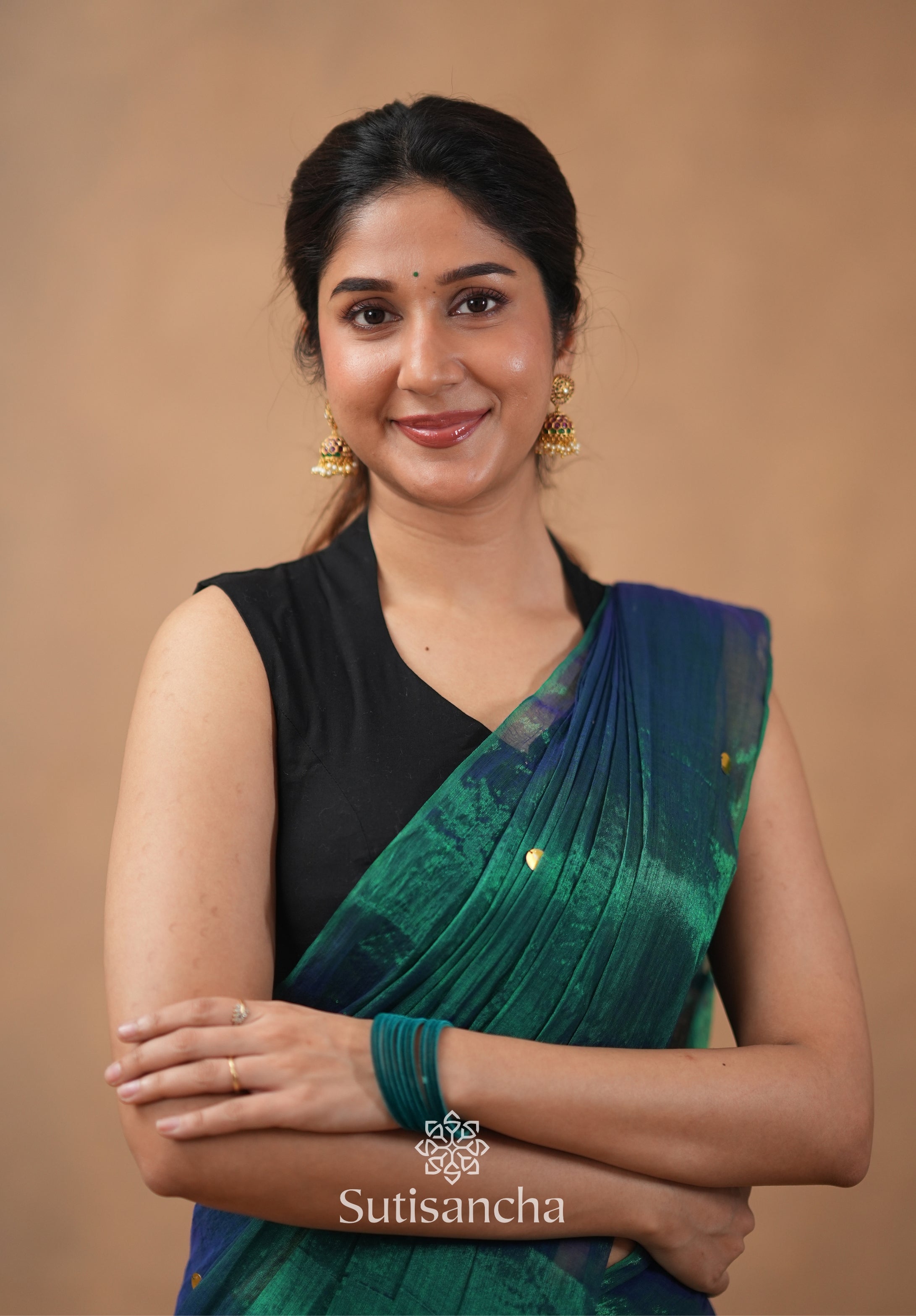 Premium Tissue Saree Accented with Siquin Shine