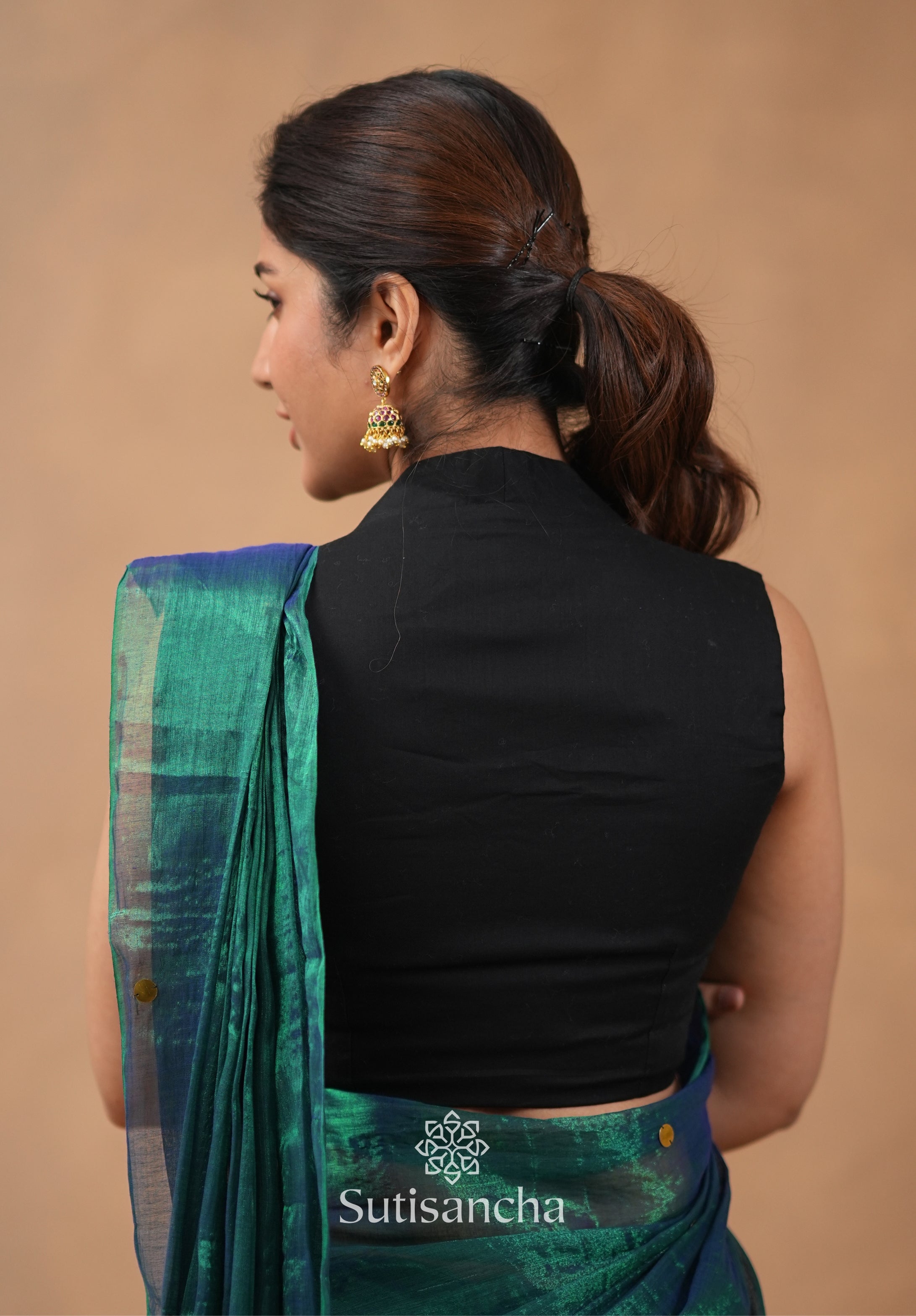 Premium Tissue Saree Accented with Siquin Shine