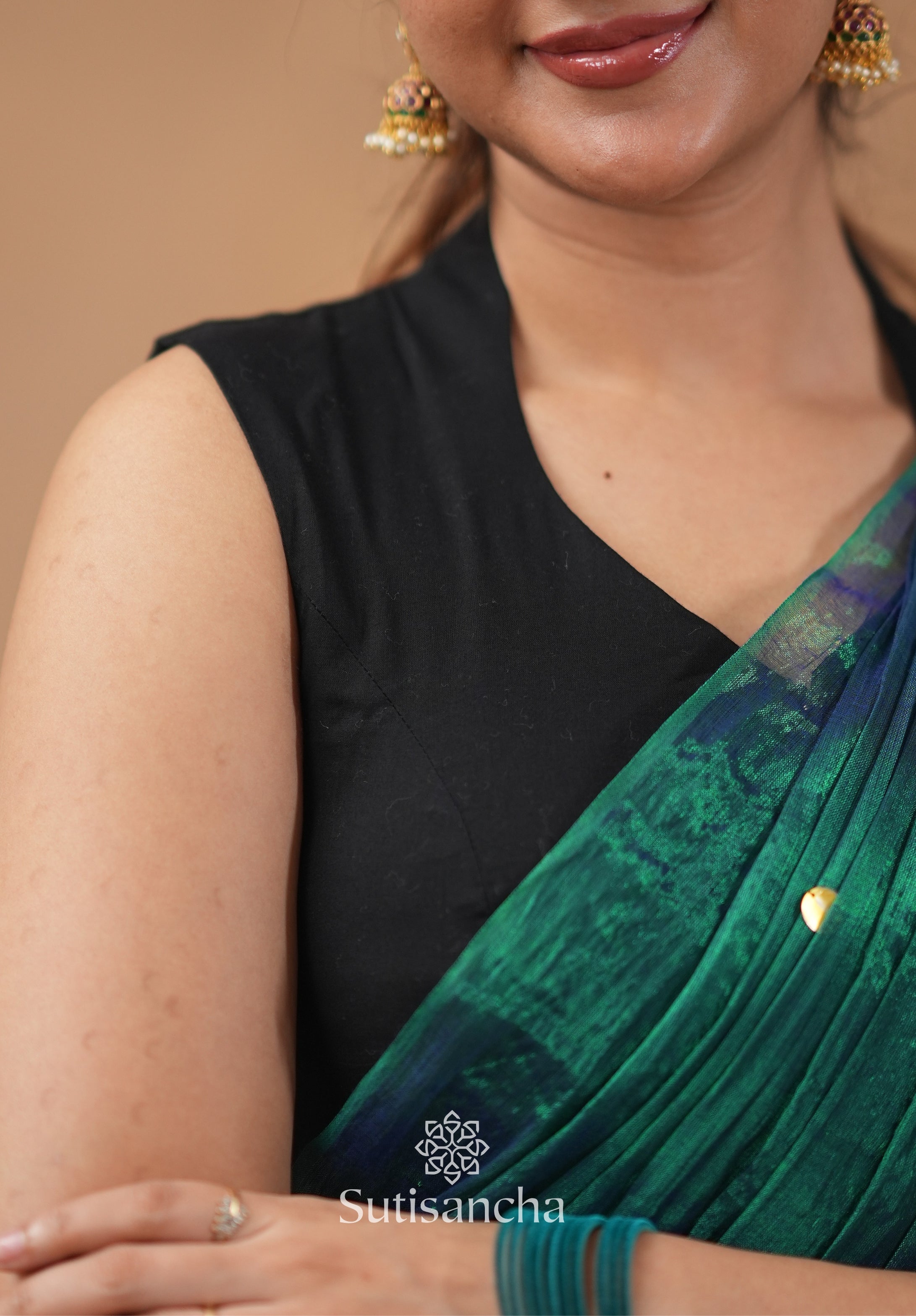 Premium Tissue Saree Accented with Siquin Shine