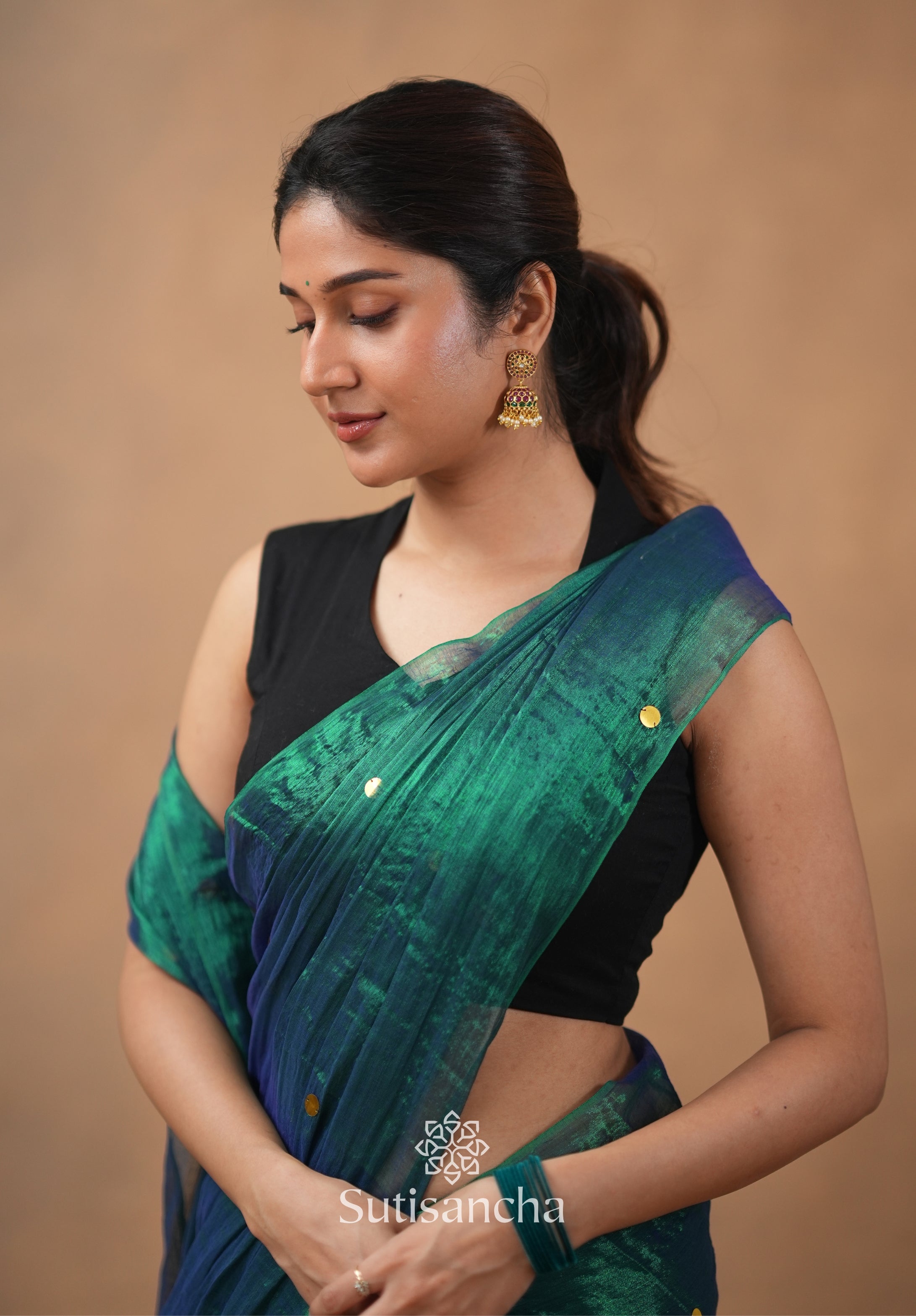 Premium Tissue Saree Accented with Siquin Shine