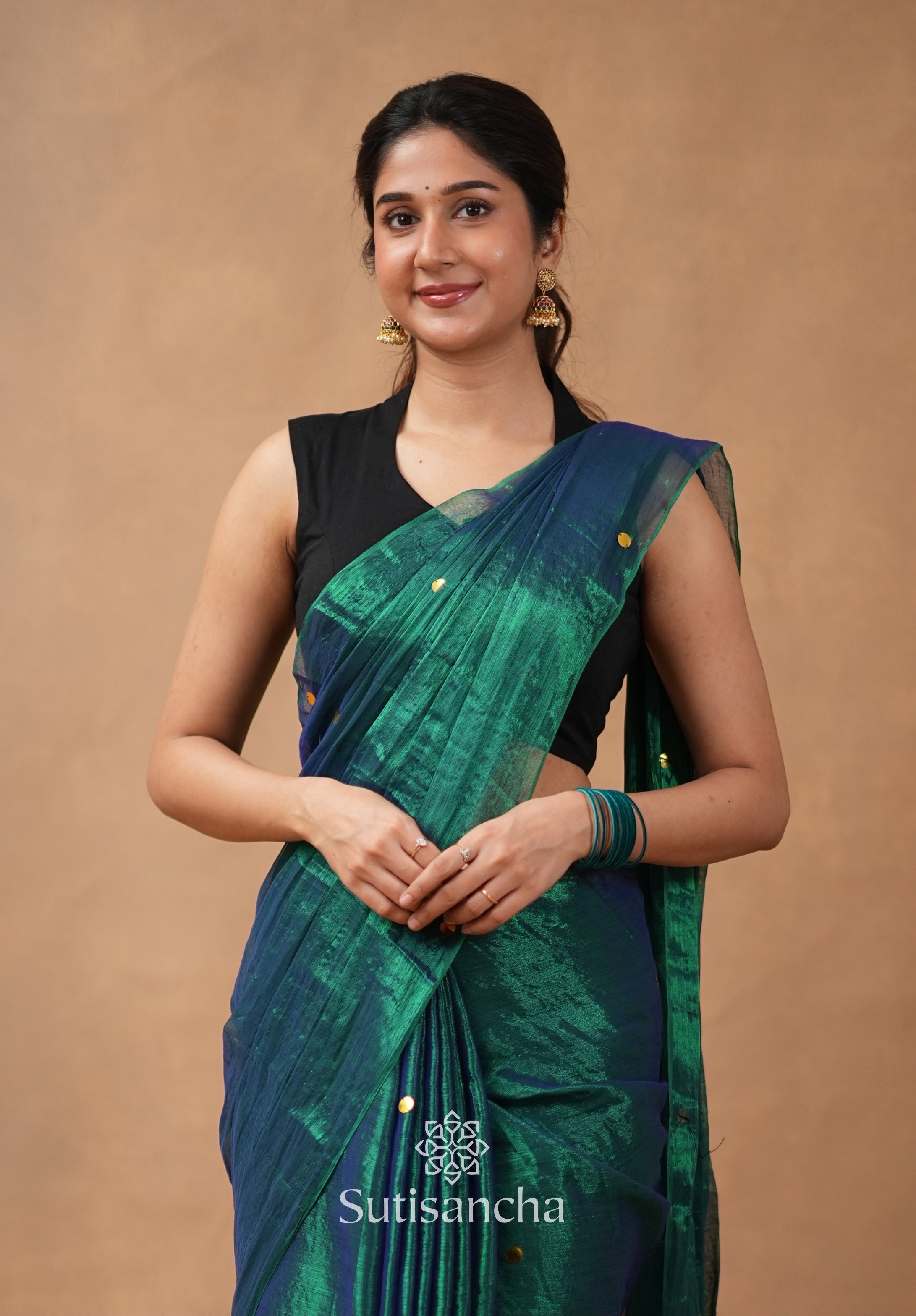 Premium Tissue Saree Accented with Siquin Shine