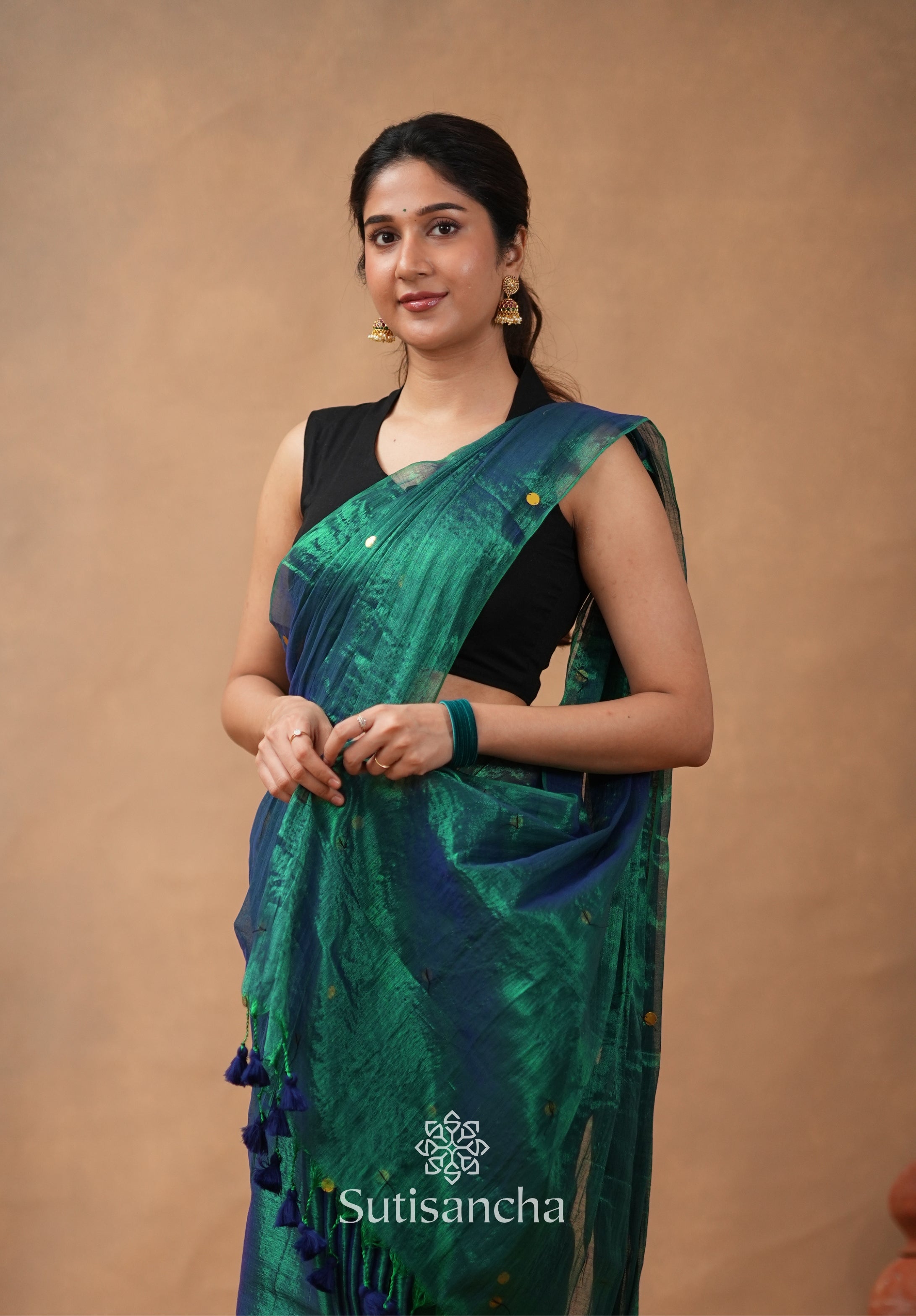 Premium Tissue Saree Accented with Siquin Shine