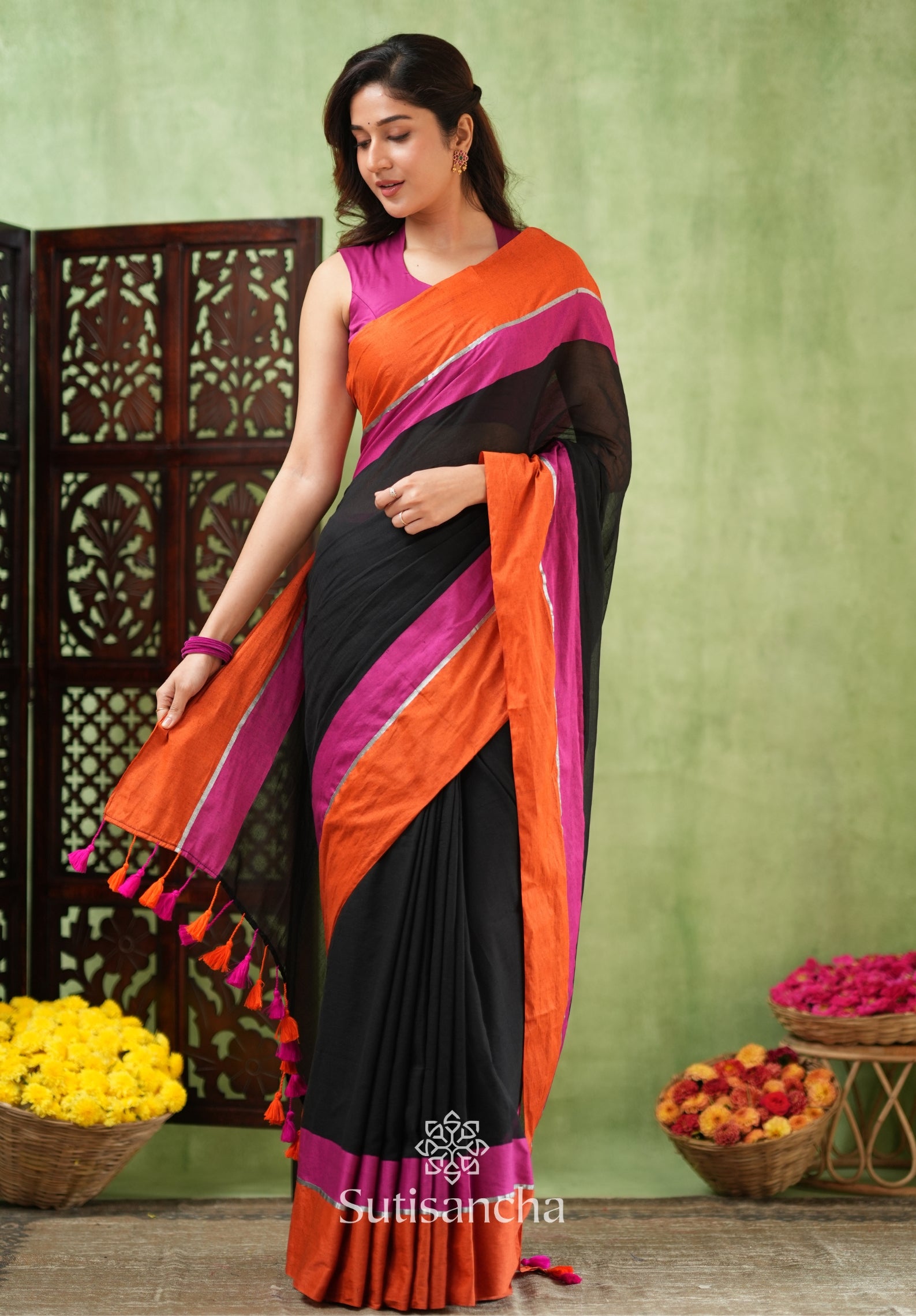 Fiery Flair Black & Orange Mul Cotton Saree with Tassel Edges