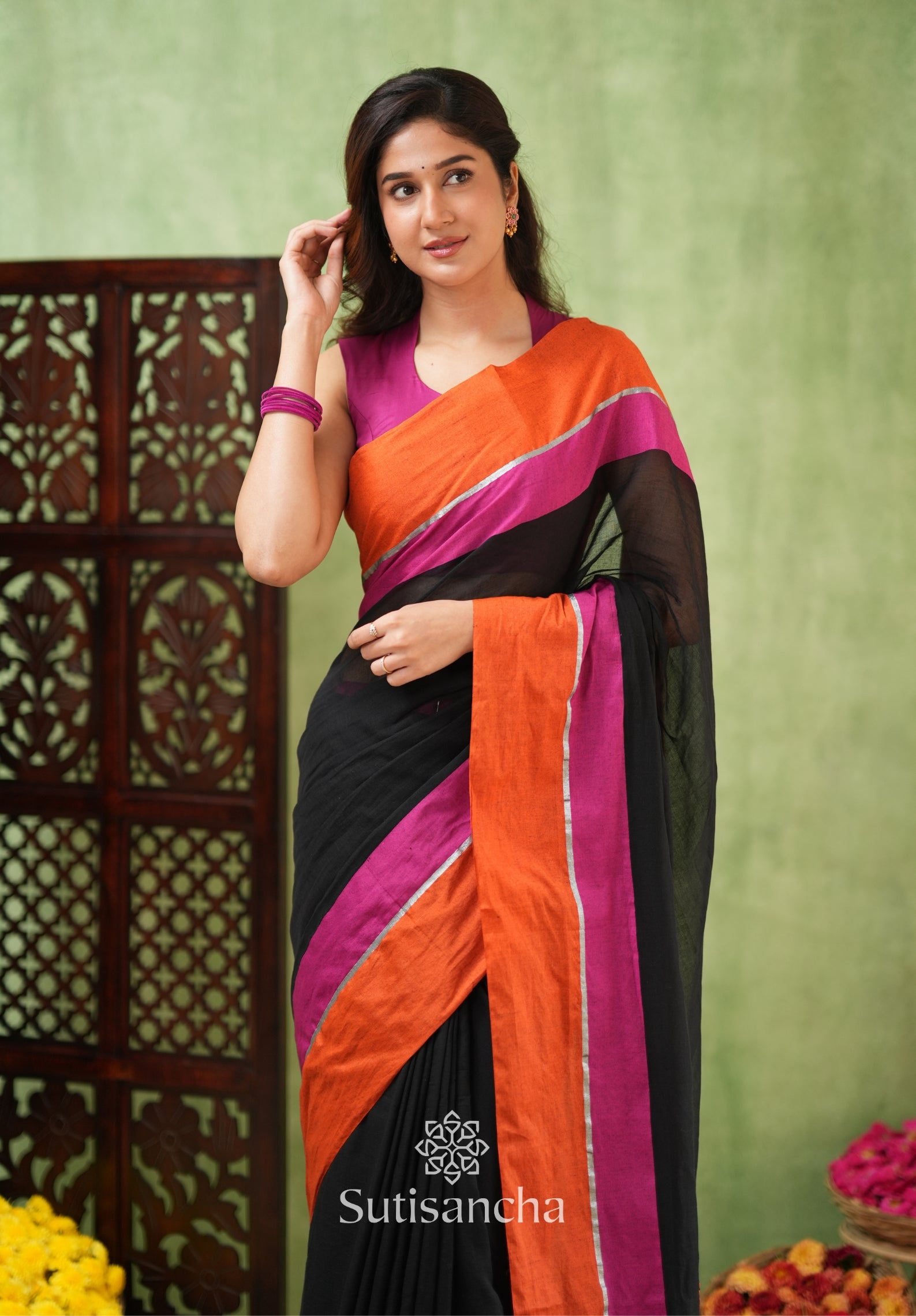 Fiery Flair Black & Orange Mul Cotton Saree with Tassel Edges