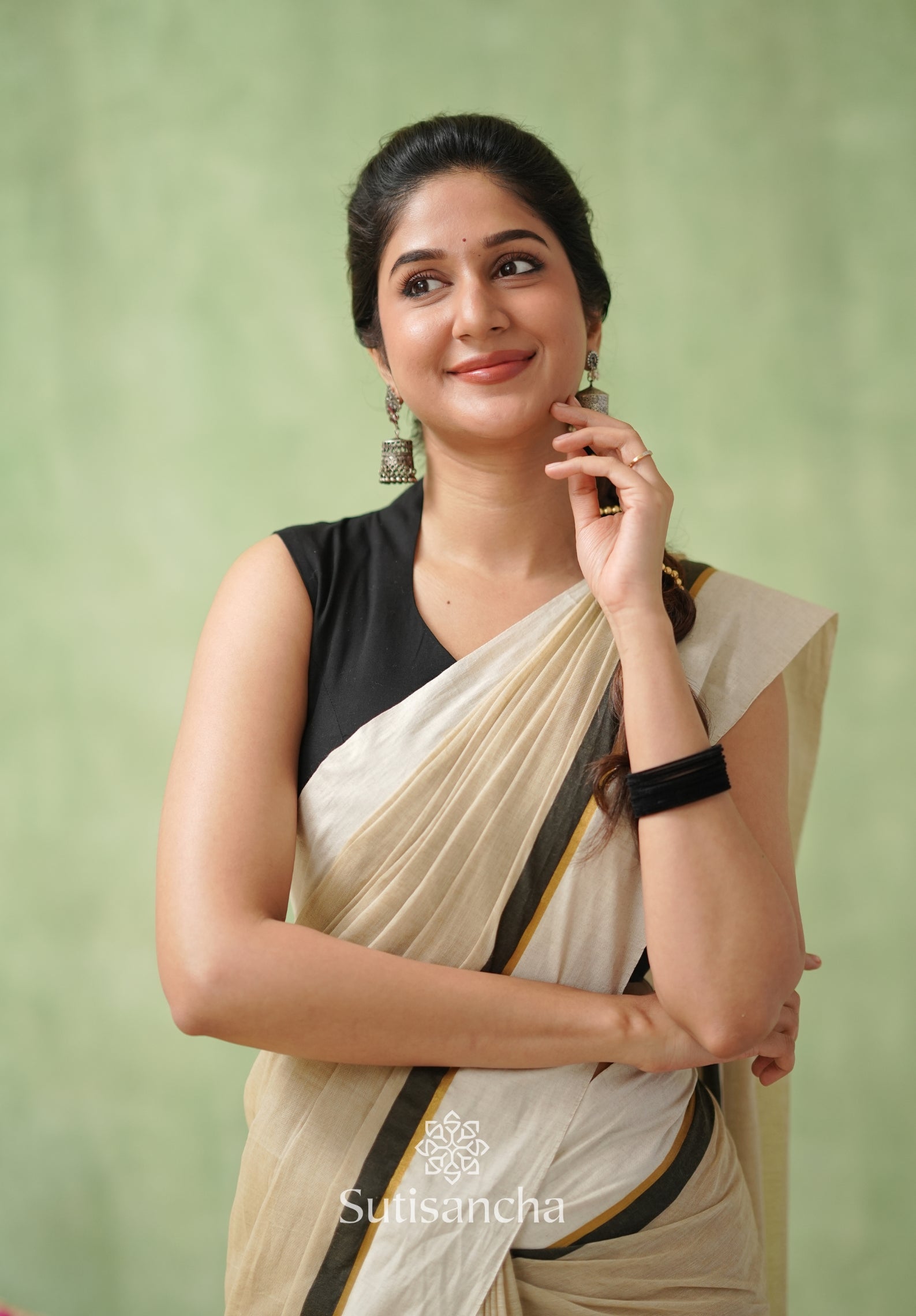 Luminous Charm Mul Saree