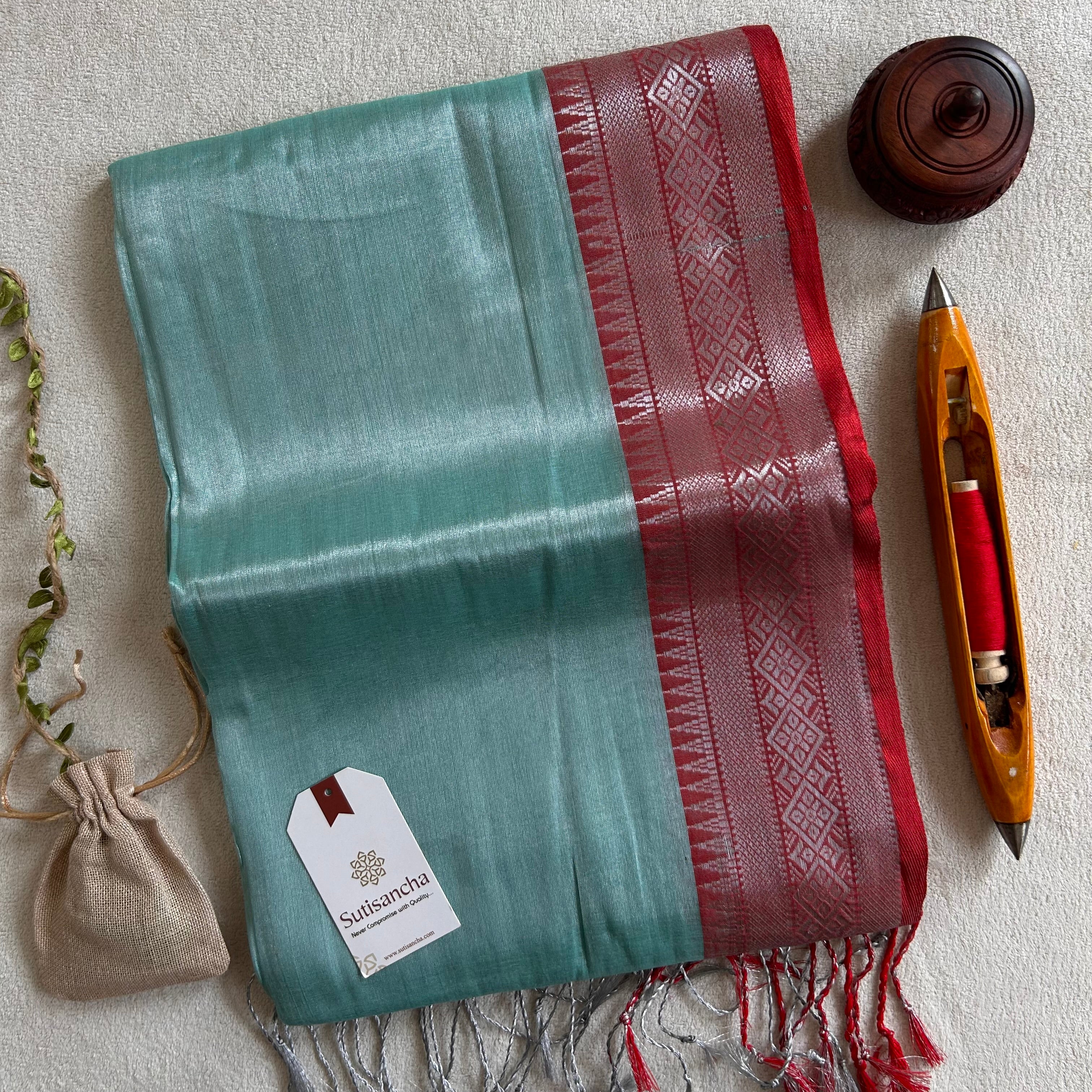 Traditional Tissue Saree with Rich Red Border