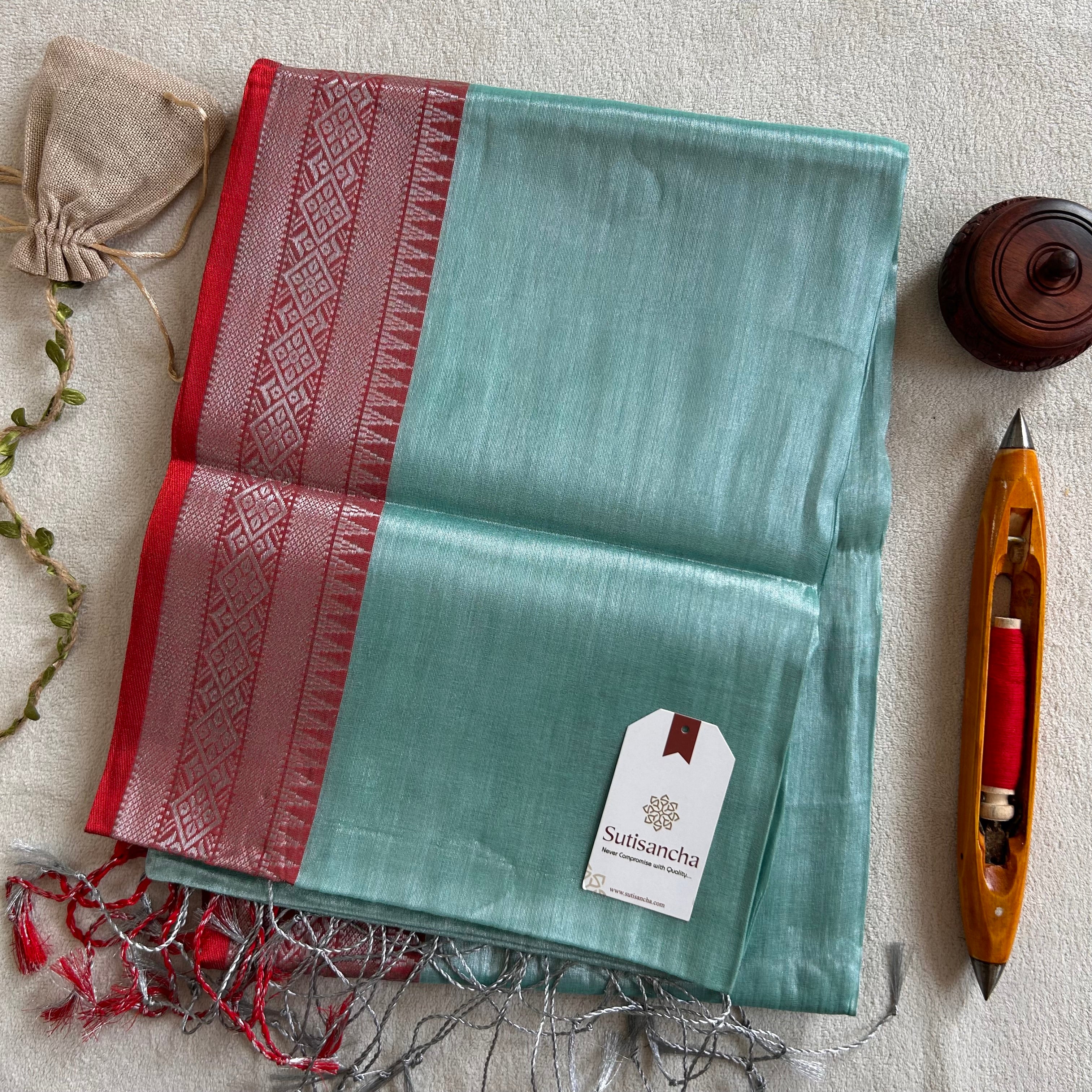 Traditional Tissue Saree with Rich Red Border