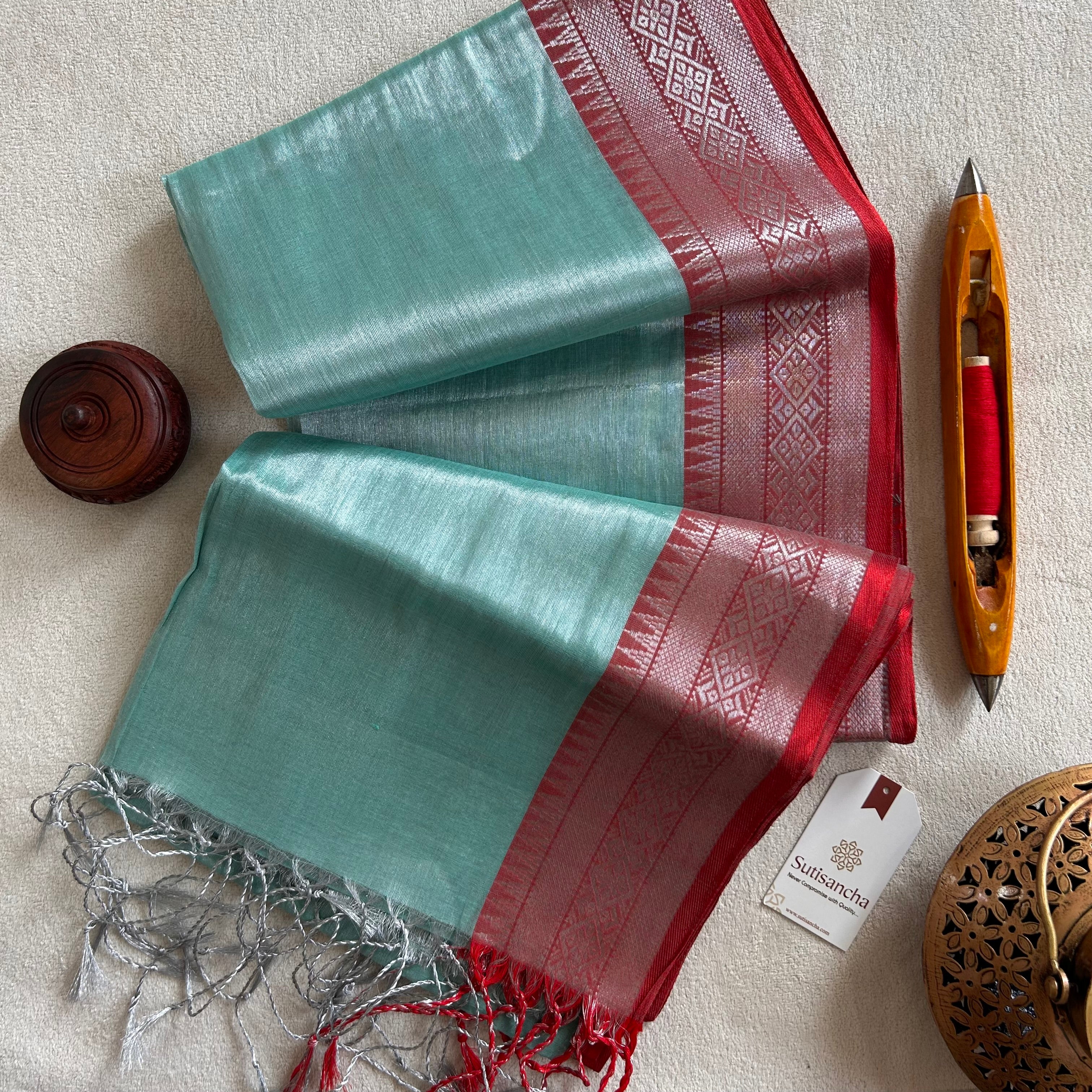 Traditional Tissue Saree with Rich Red Border