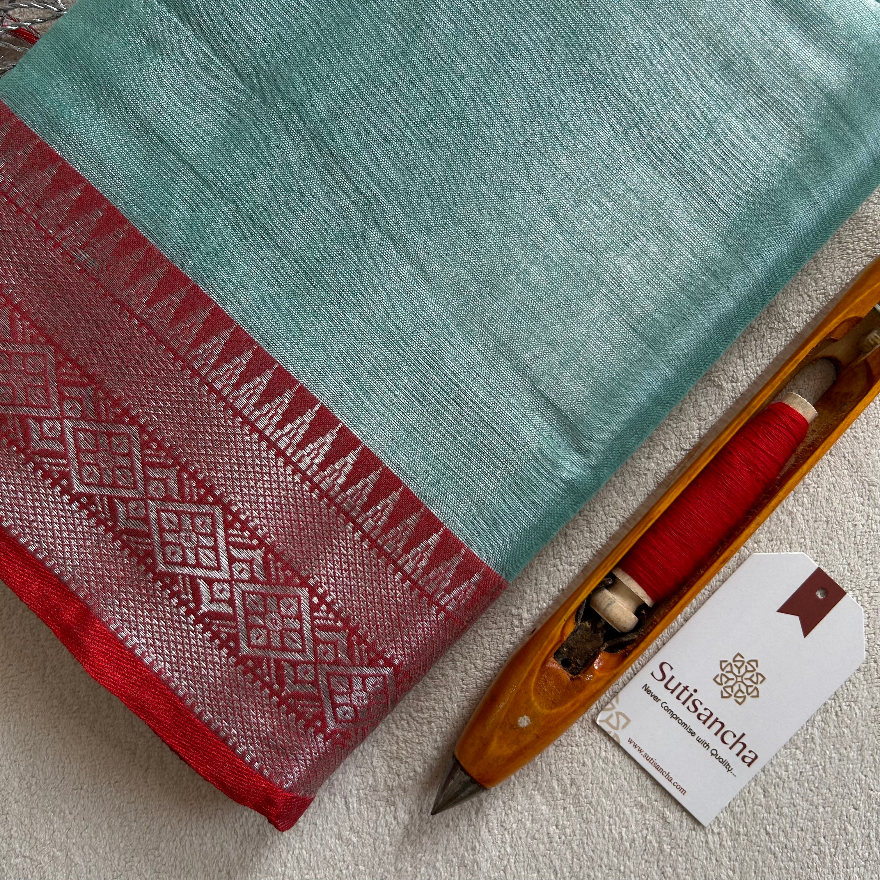 Traditional Tissue Saree with Rich Red Border