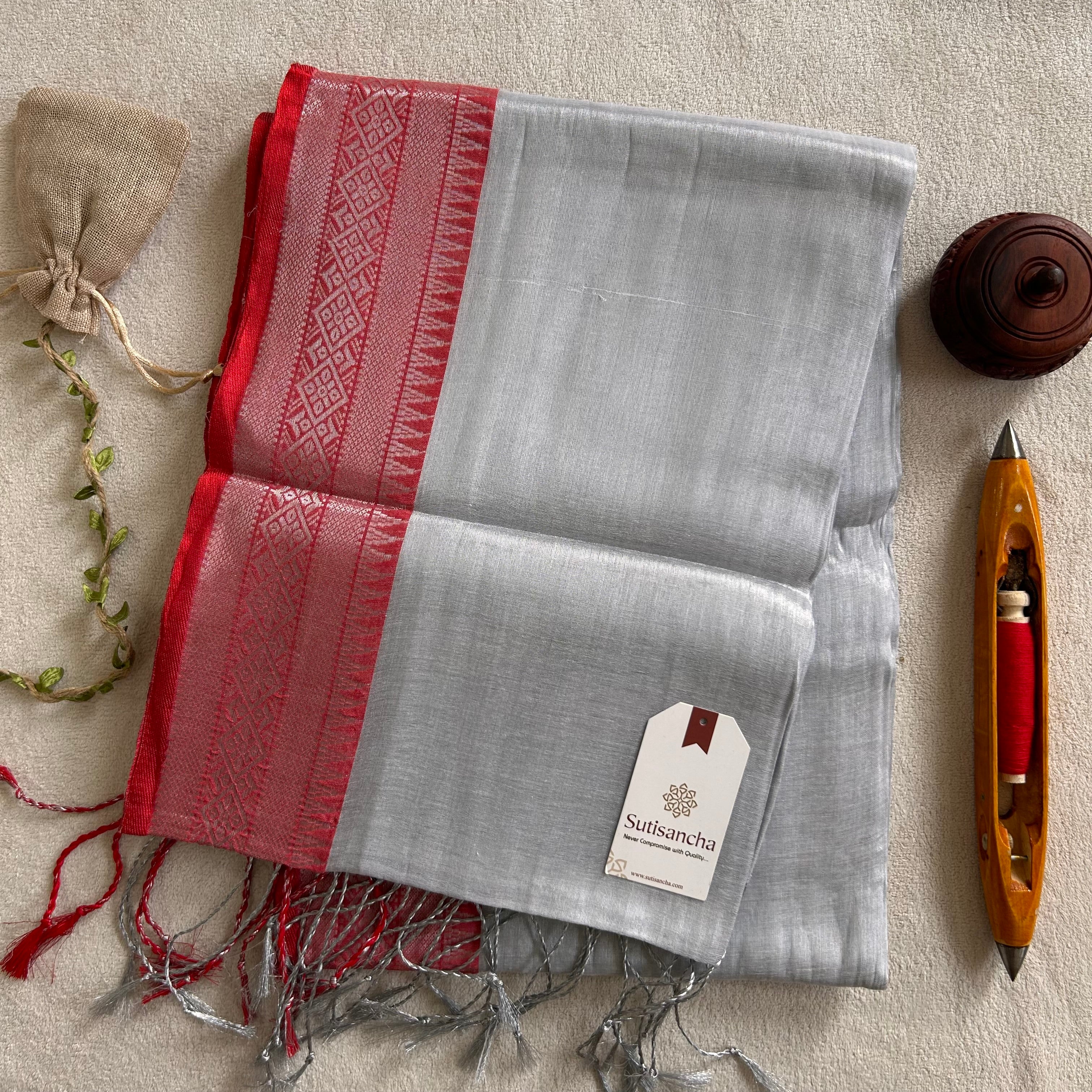 Traditional Tissue Saree with Rich Red Border