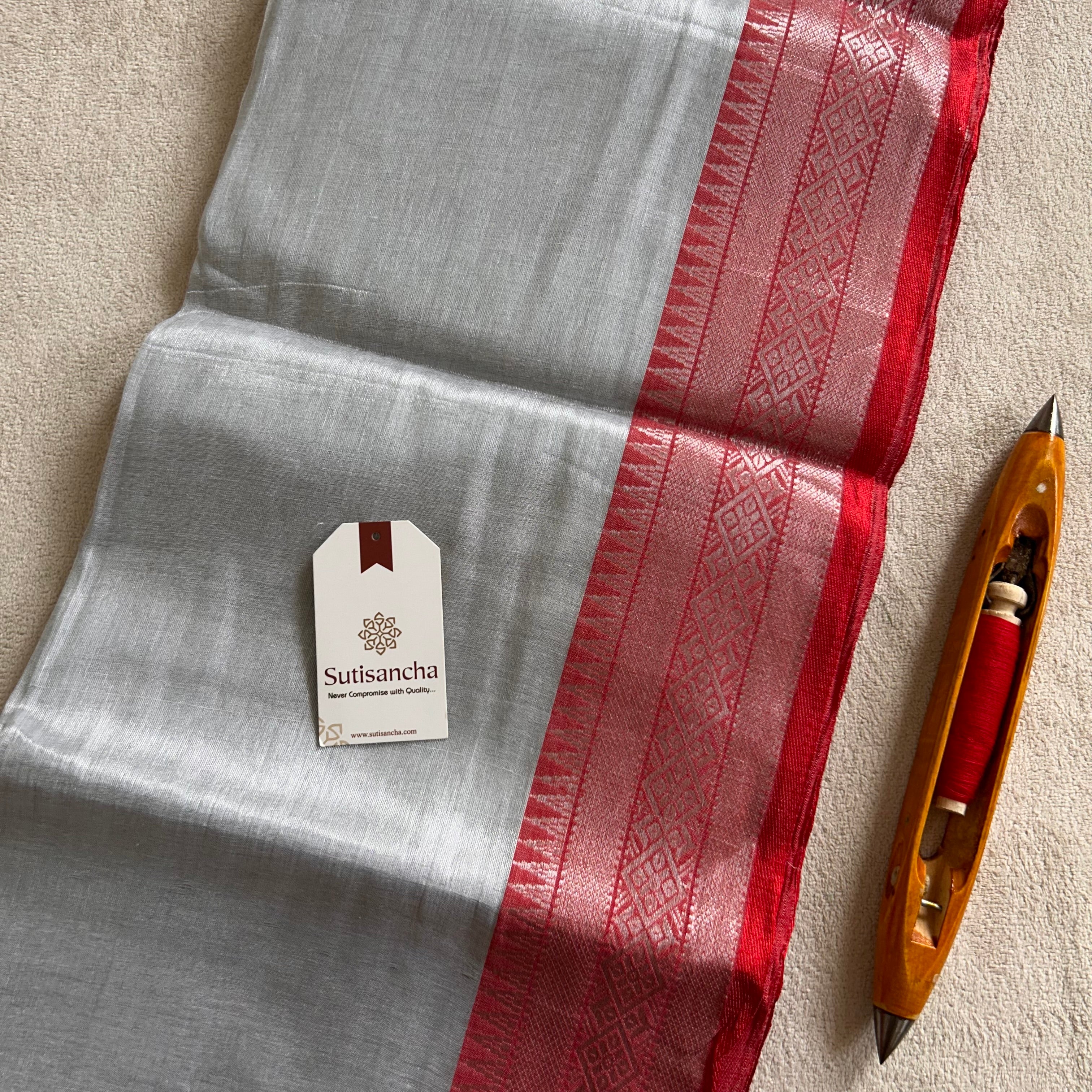 Traditional Tissue Saree with Rich Red Border