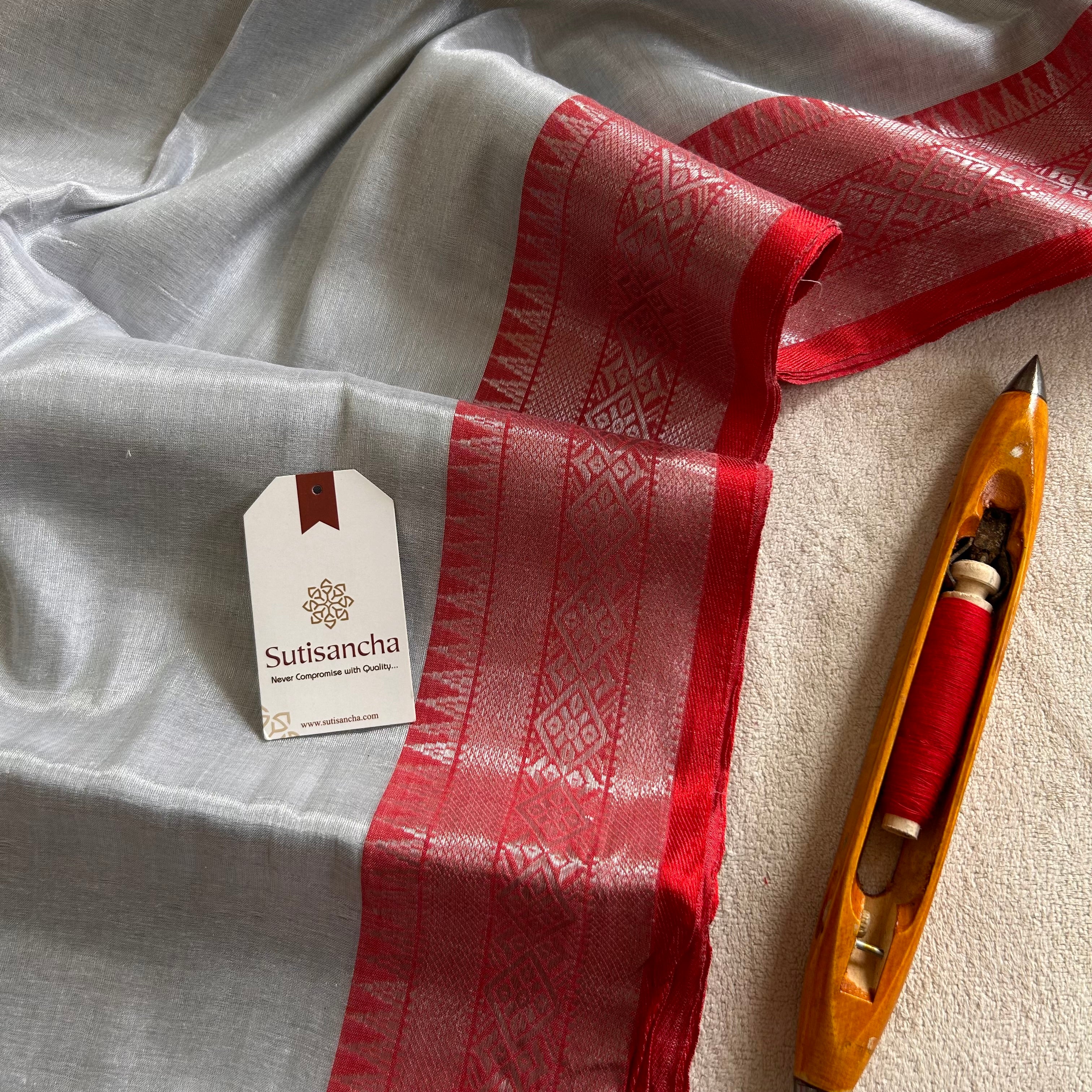 Traditional Tissue Saree with Rich Red Border