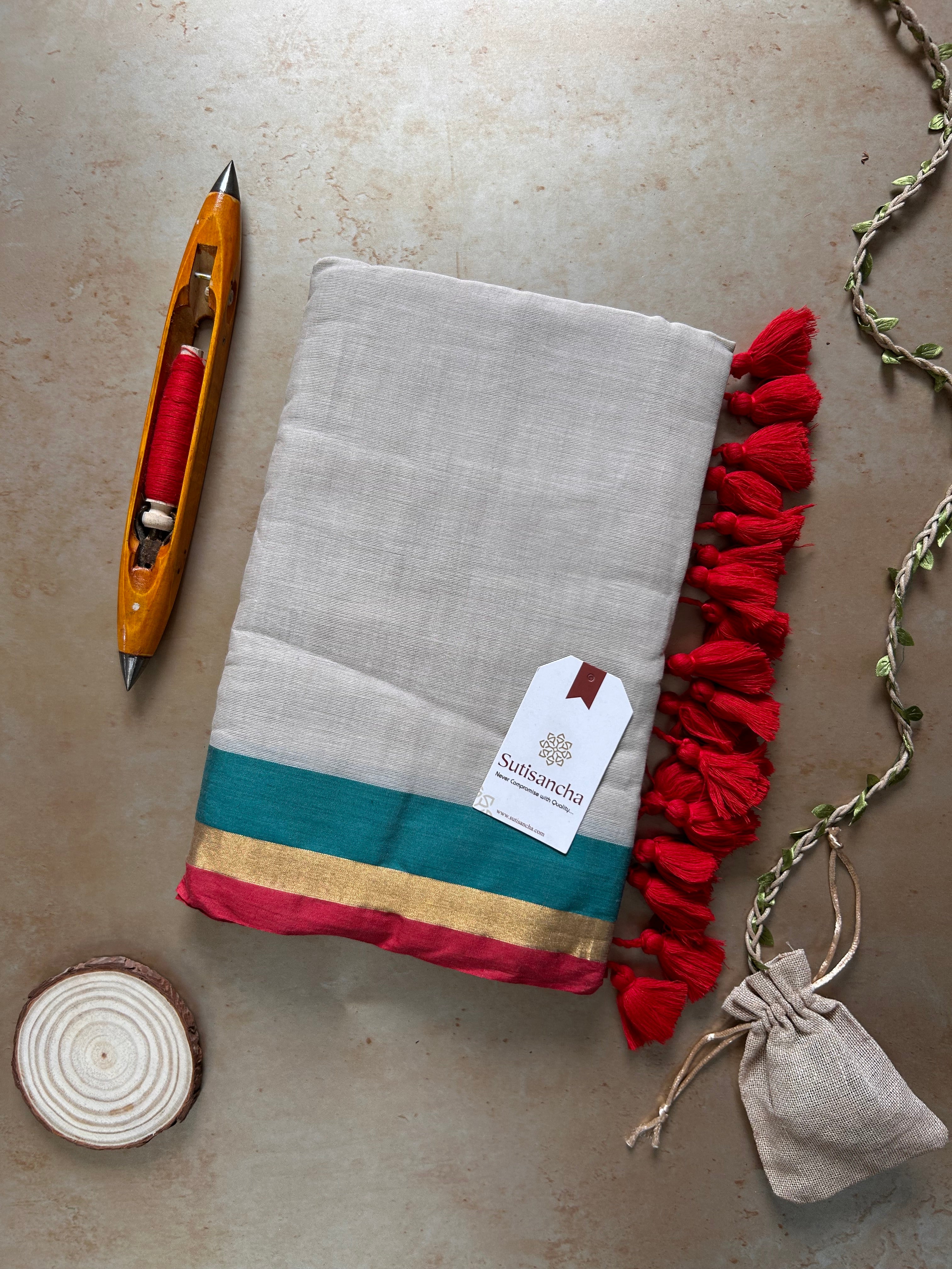 Border Bliss Mul Cotton Saree by Sutisancha