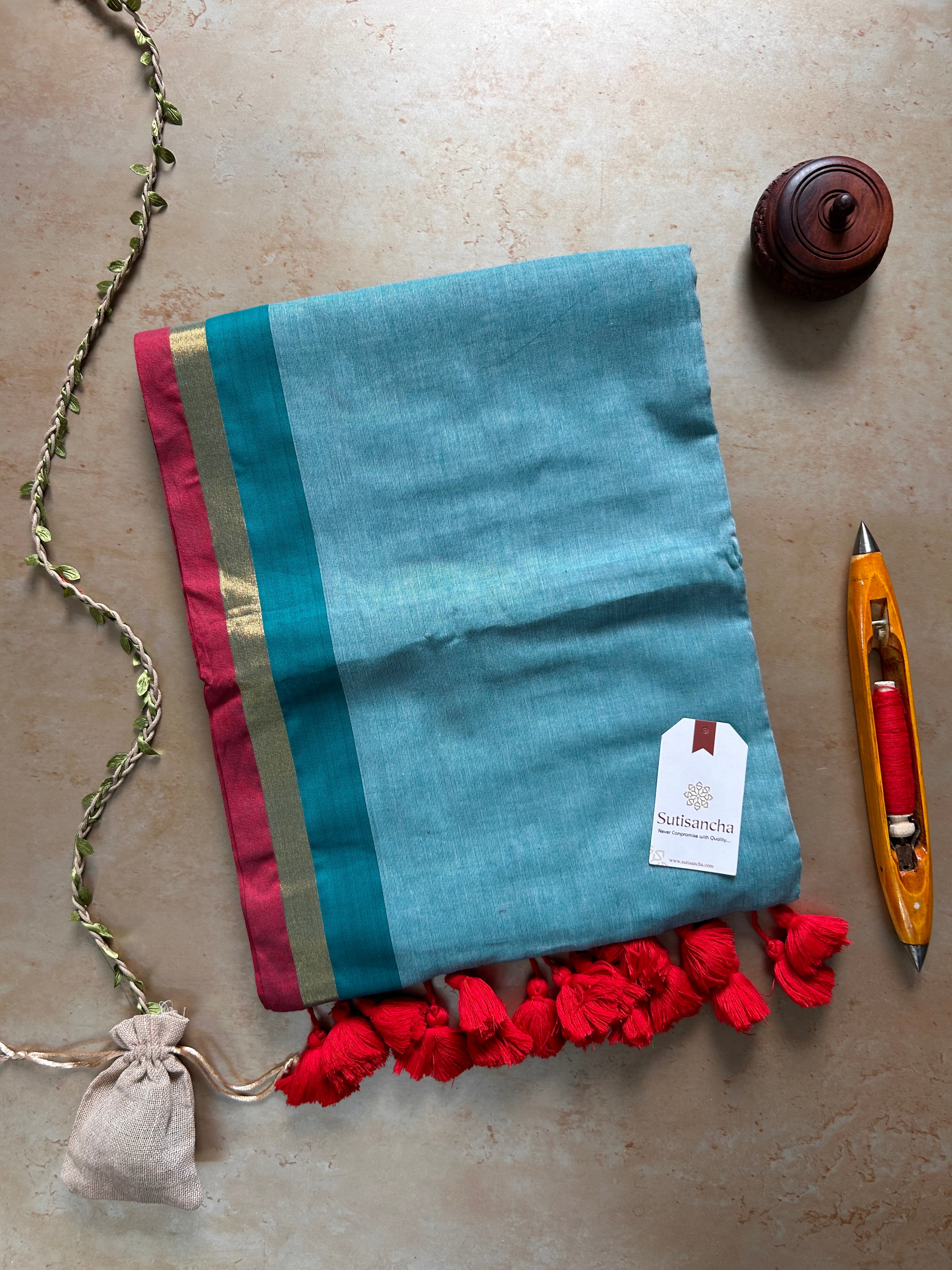Border Bliss Mul Cotton Saree by Sutisancha