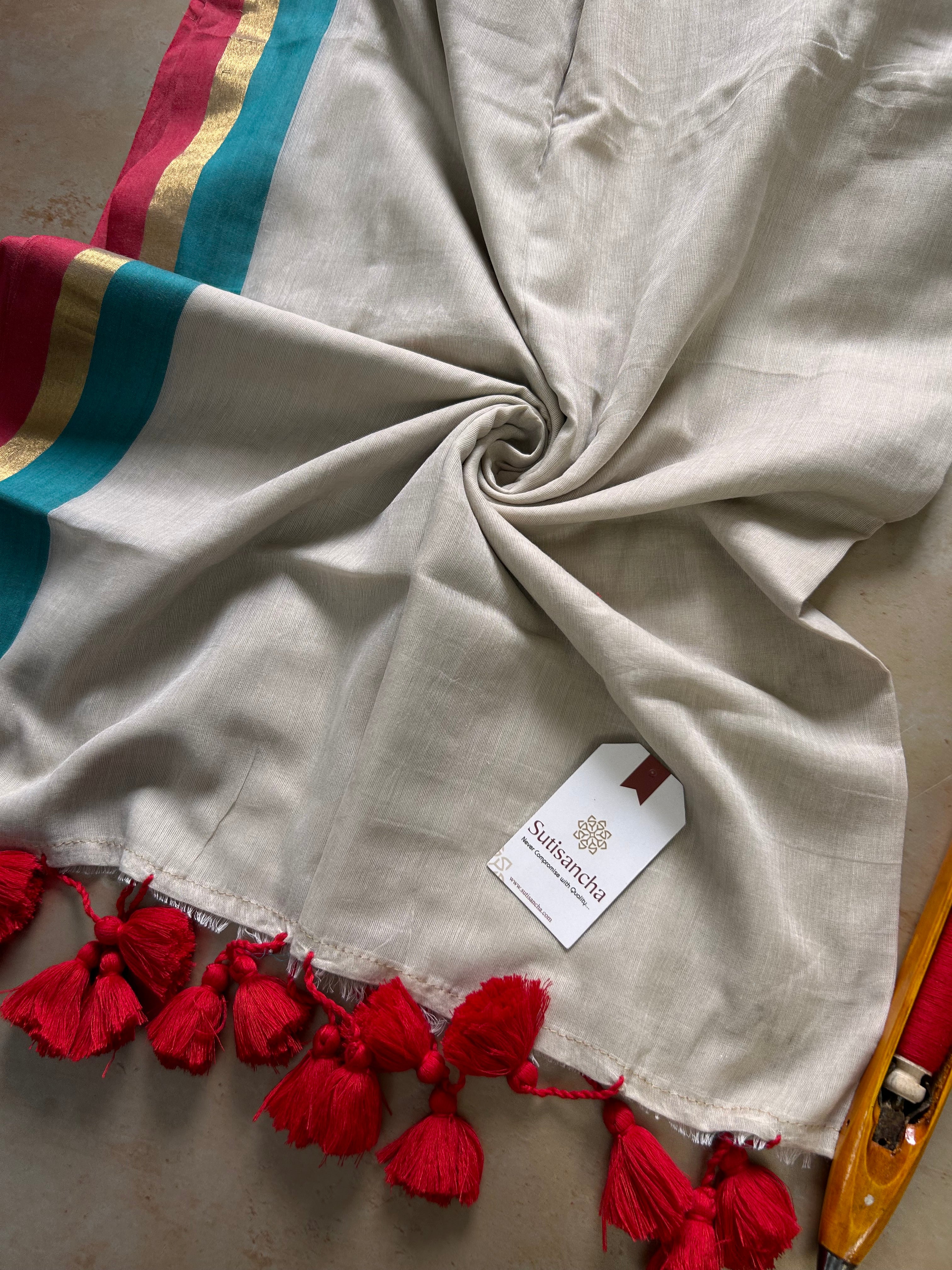 Border Bliss Mul Cotton Saree by Sutisancha