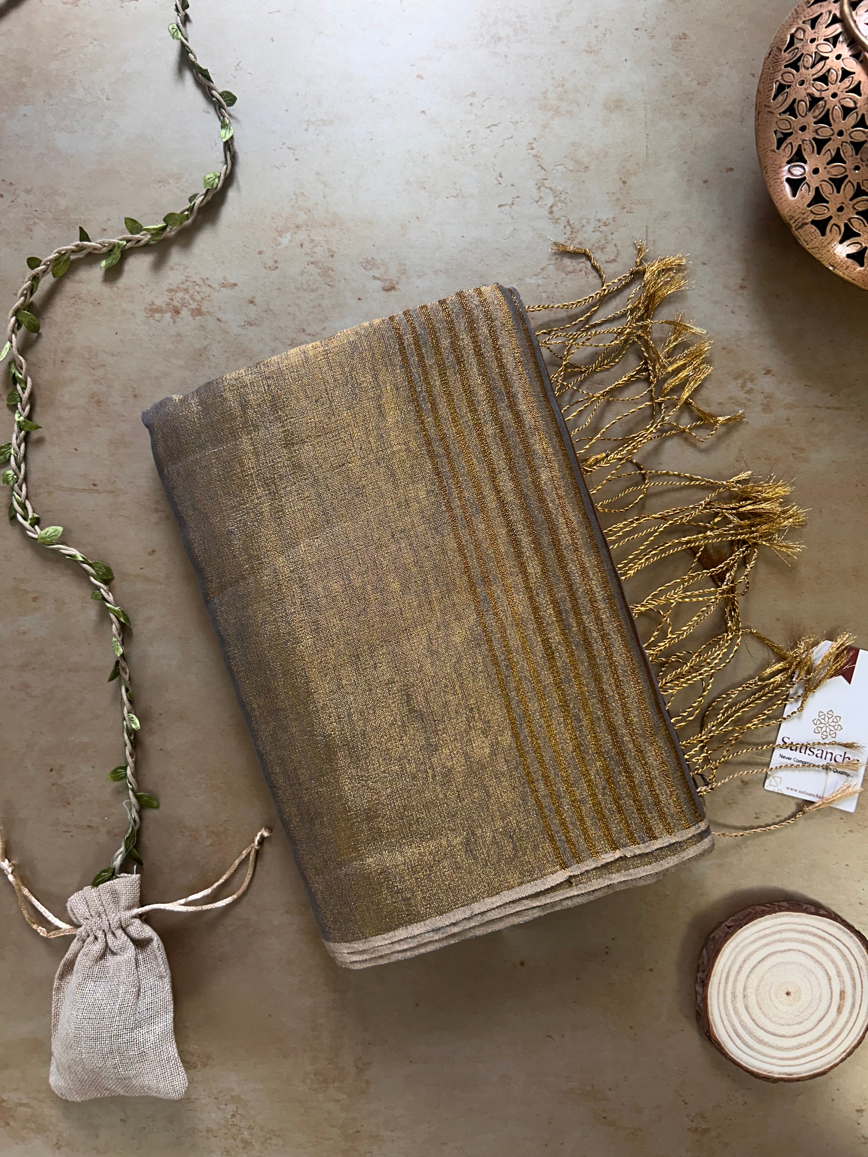 Tissue Charm Light and Lustrous Linen Saree