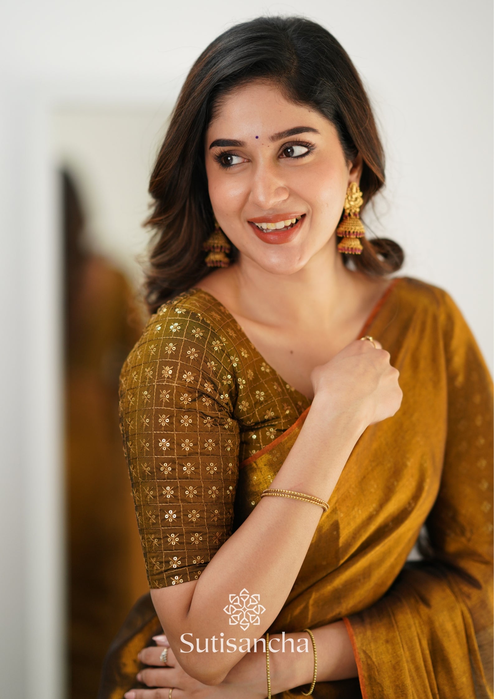 Sutisancha Metallic Gold Handloom Tissue Saree With Designer Blouse