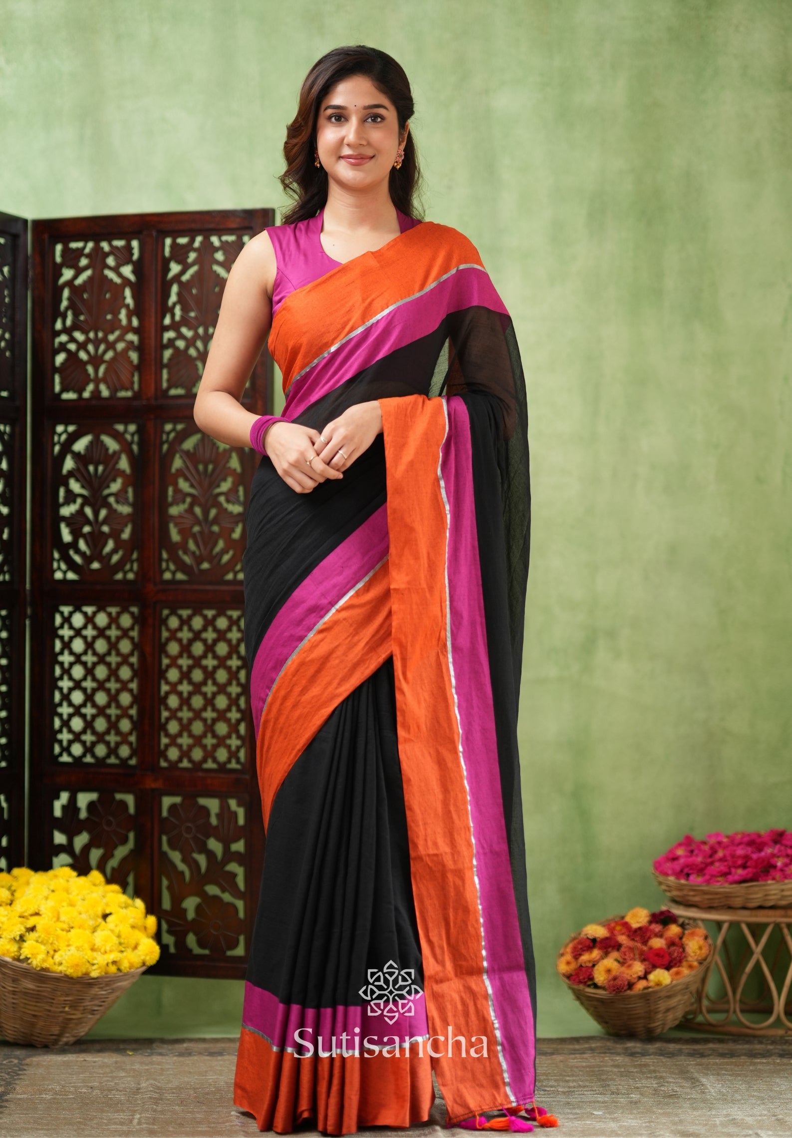 Fiery Flair Black & Orange Mul Cotton Saree with Tassel Edges