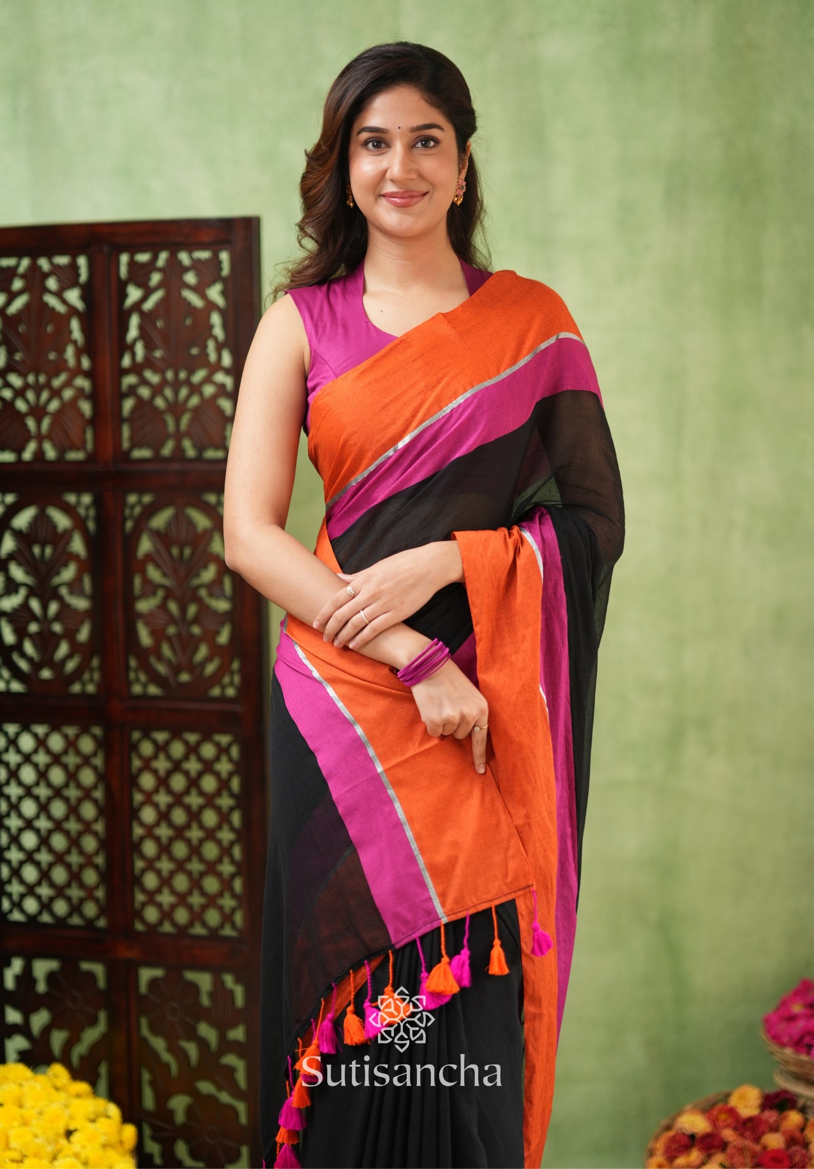 Fiery Flair Black & Orange Mul Cotton Saree with Tassel Edges
