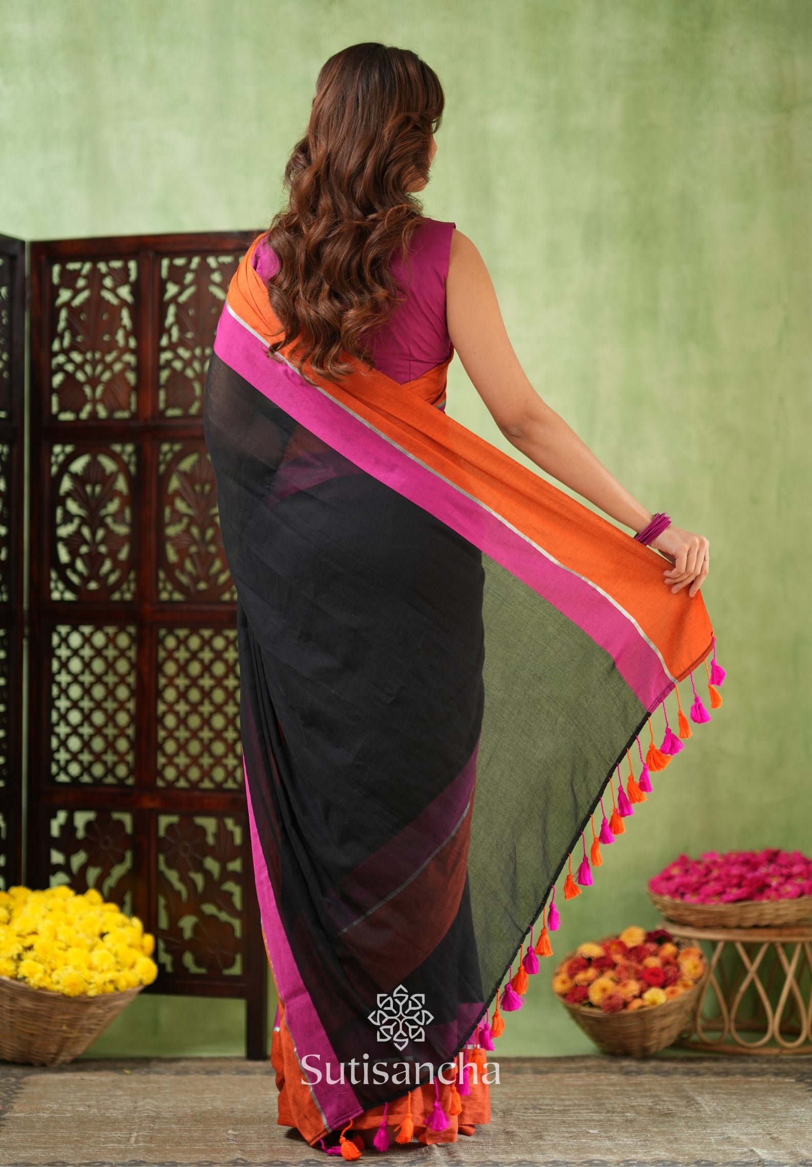 Fiery Flair Black & Orange Mul Cotton Saree with Tassel Edges
