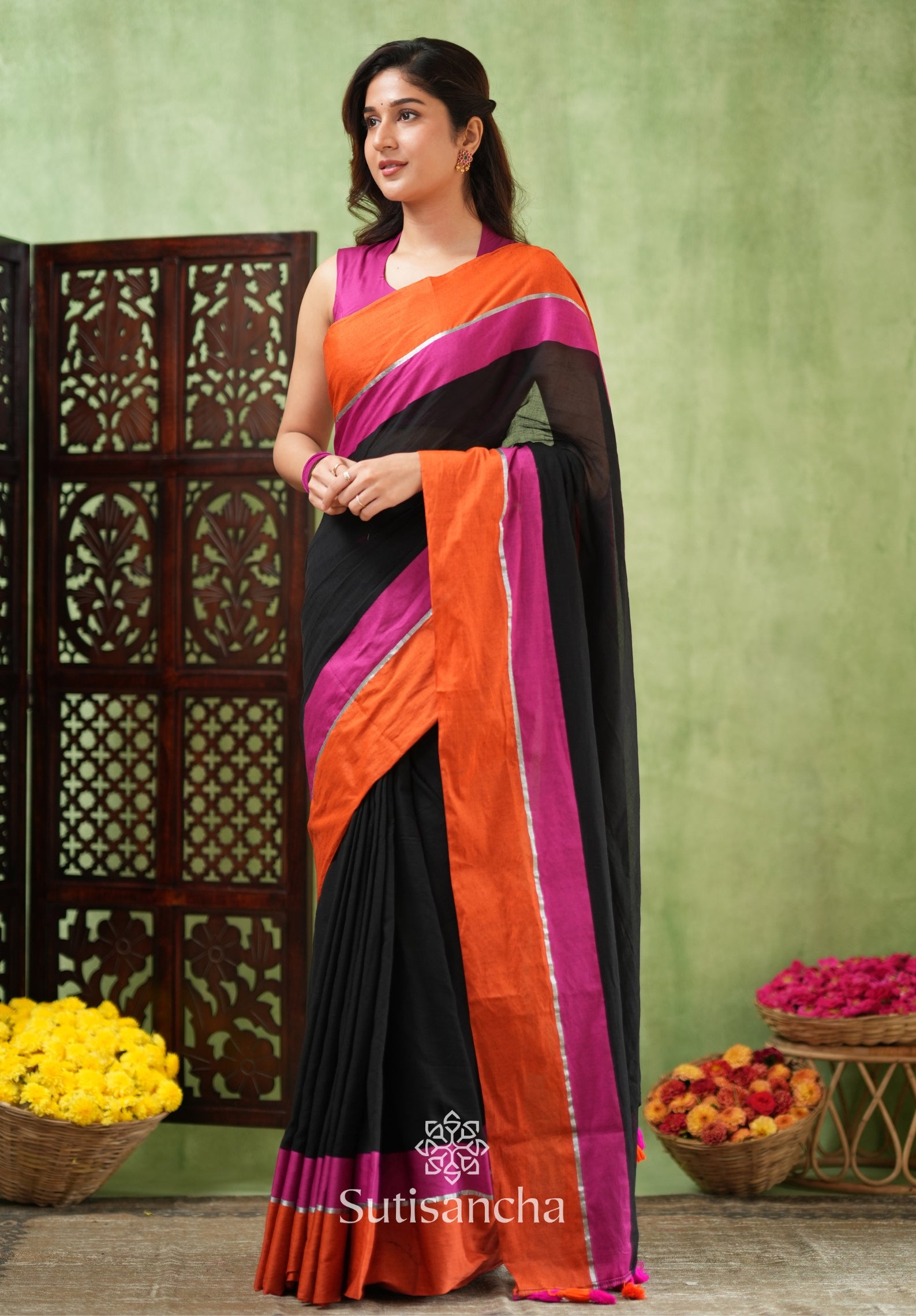 Fiery Flair Black & Orange Mul Cotton Saree with Tassel Edges