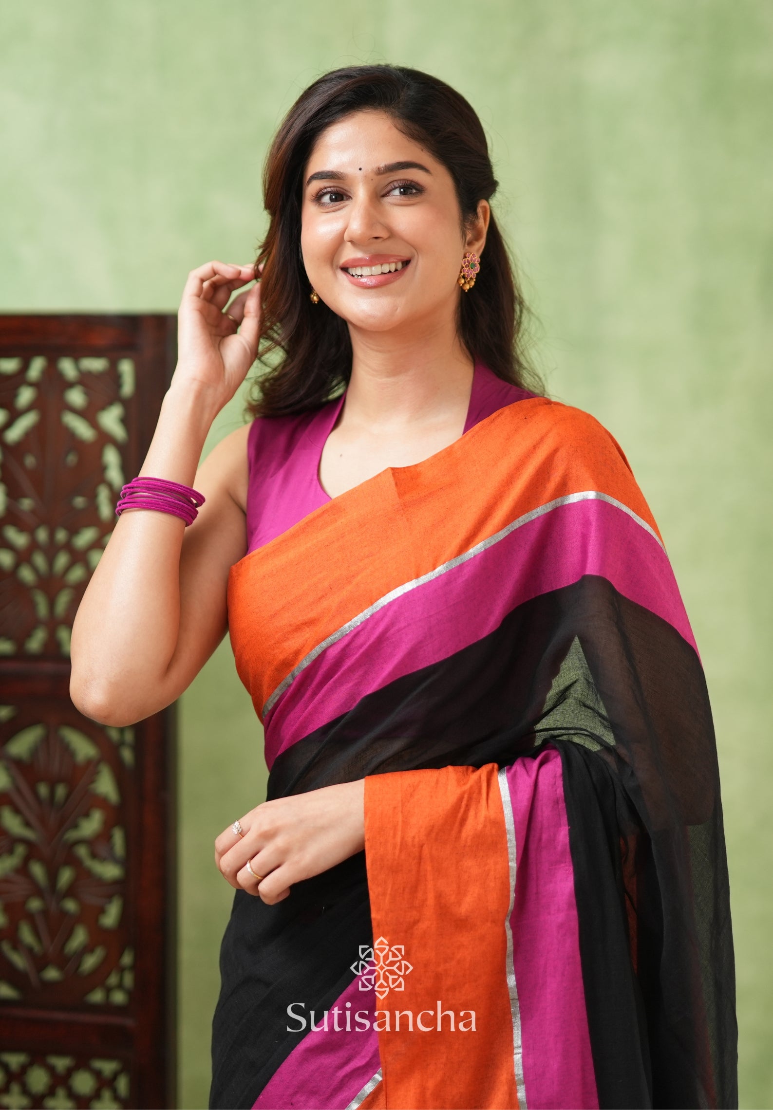 Fiery Flair Black & Orange Mul Cotton Saree with Tassel Edges