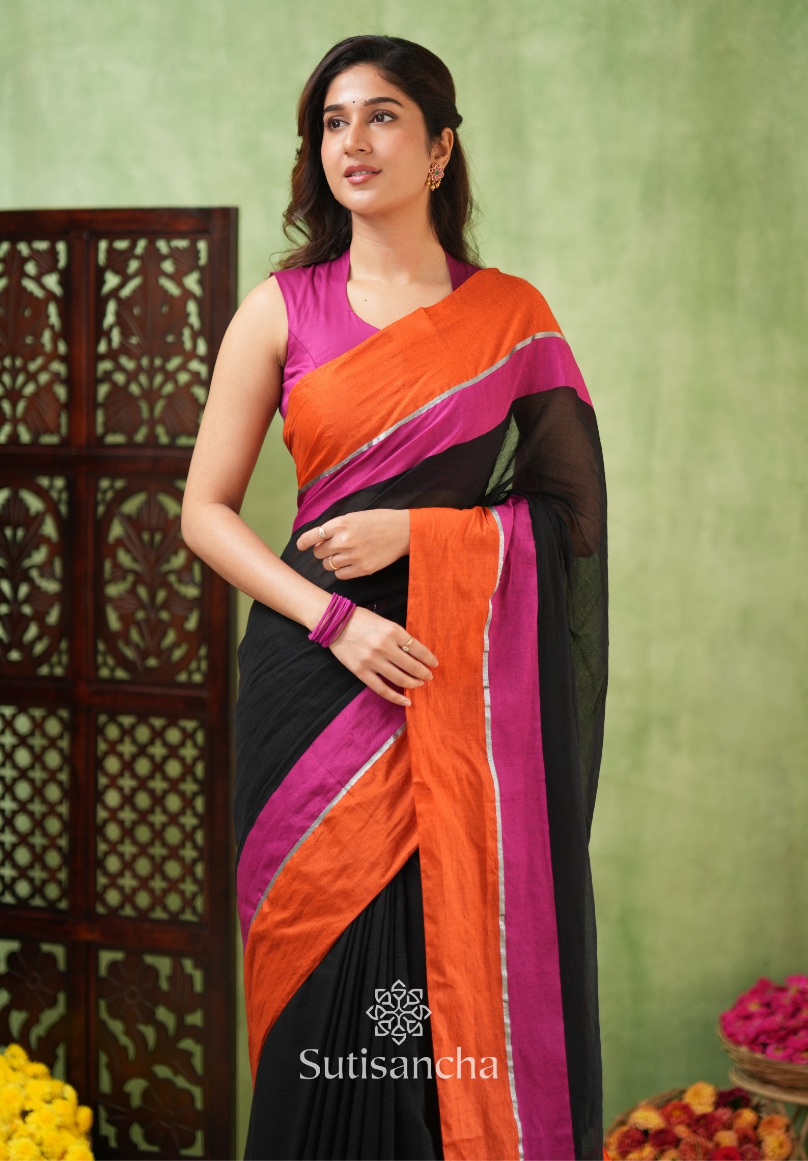 Fiery Flair Black & Orange Mul Cotton Saree with Tassel Edges