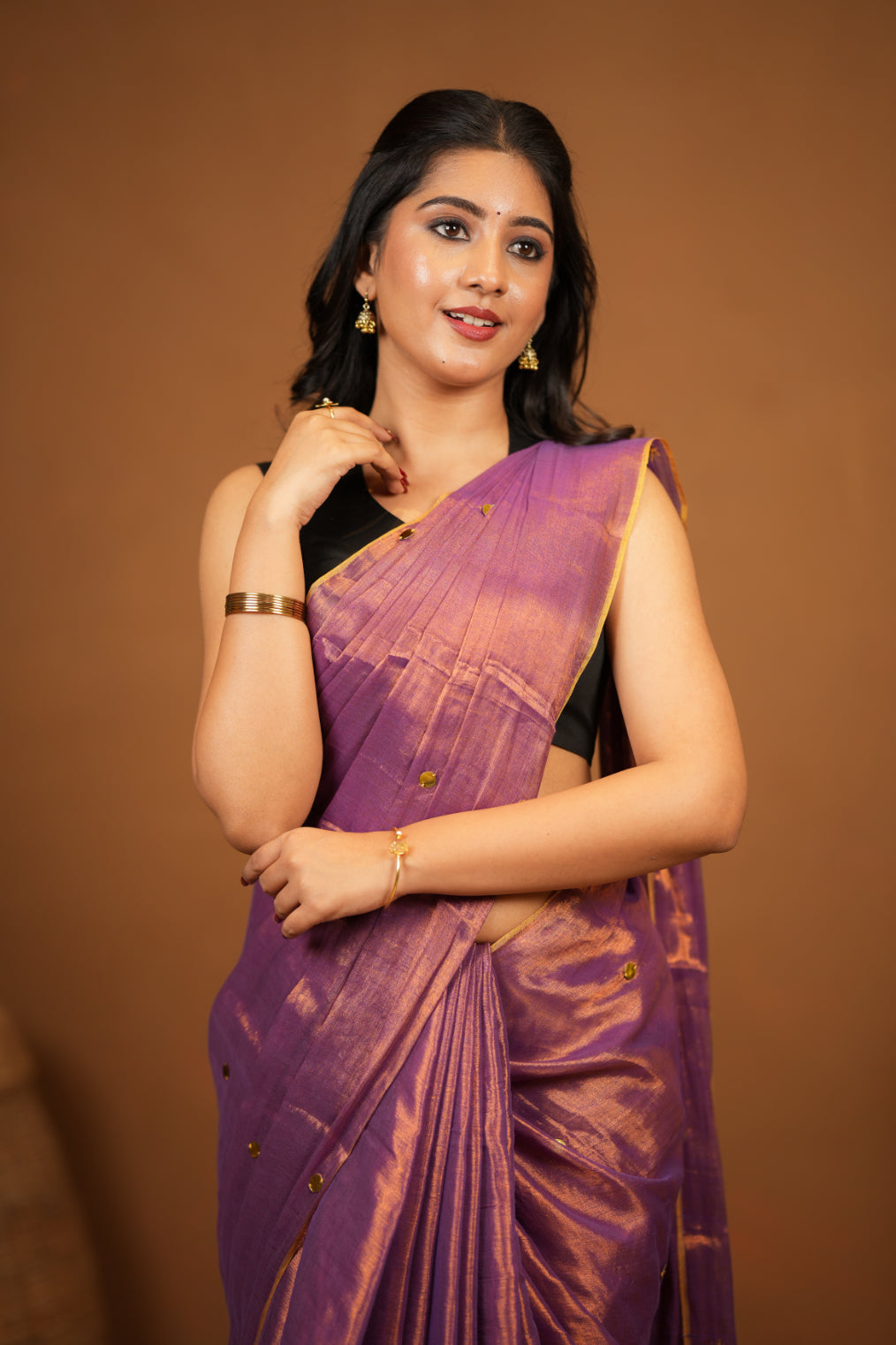 Premium Tissue Saree Accented with Siquin Shine