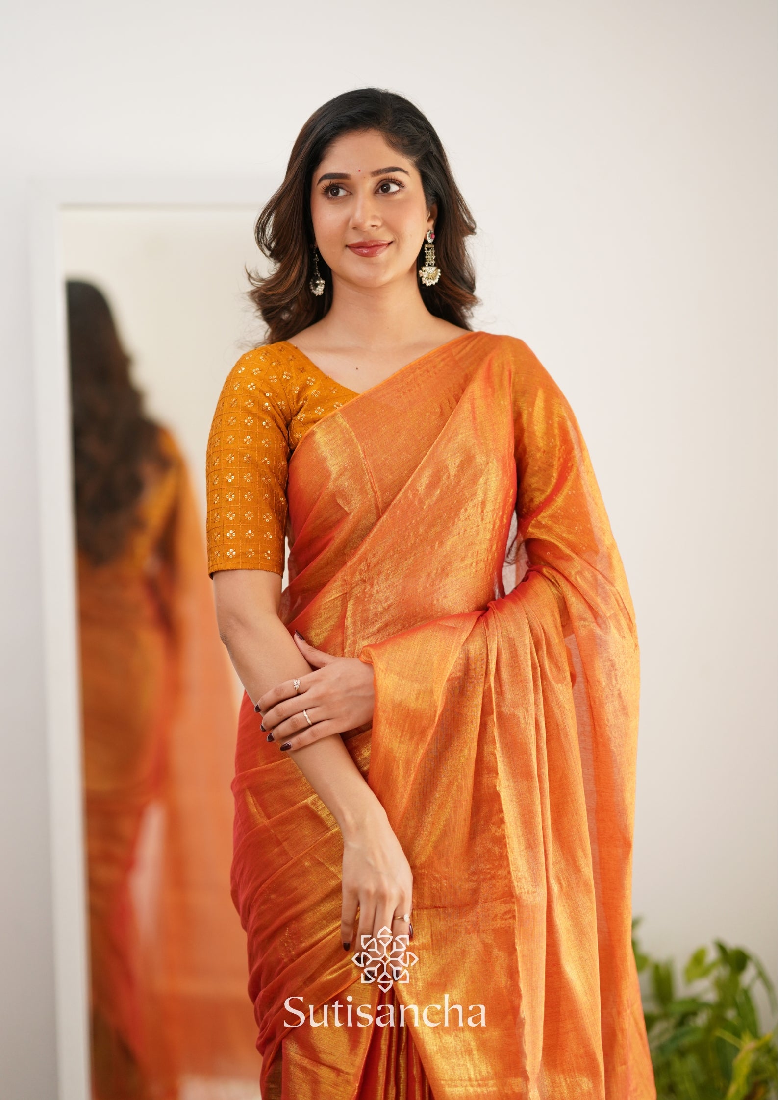 Sutisancha Orange Handloom Tissue Saree With Designer Blouse